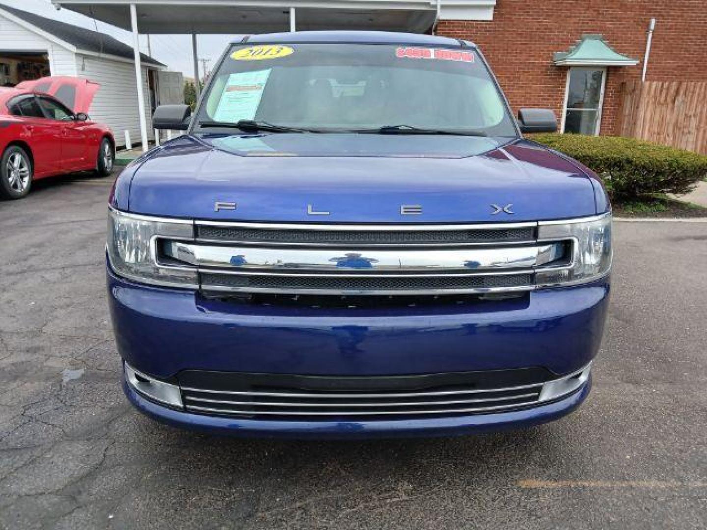 2013 Ford Flex SE FWD (2FMGK5B8XDB) with an 3.5L V6 DOHC 24V engine, 6-Speed Automatic Overdrive transmission, located at 1865 W 2nd St., Xenia, OH, 45385, (937) 372-7777, 39.681259, -83.961945 - 2013 Ford Flex SE FWD - Photo#4