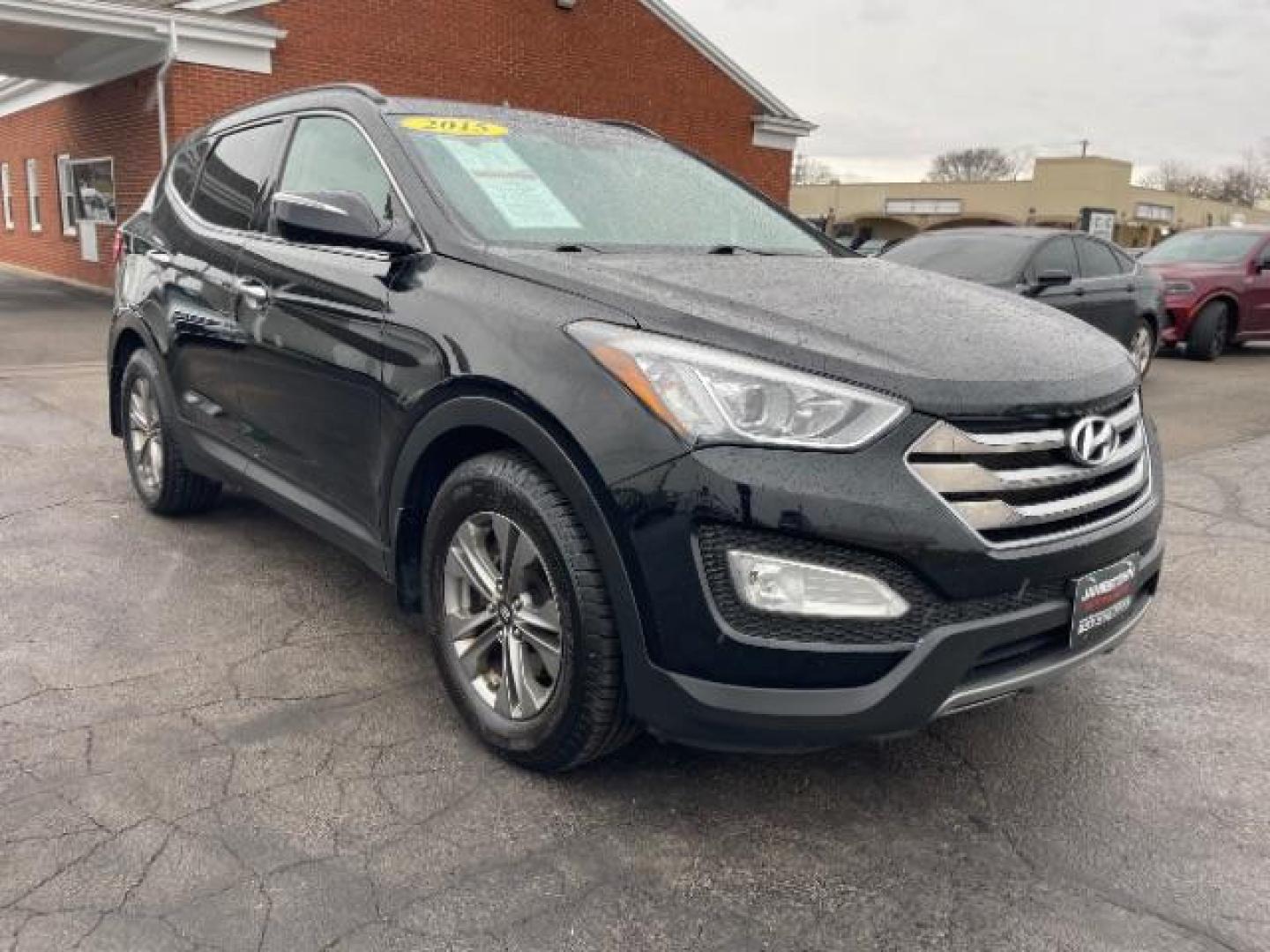 2015 Hyundai Santa Fe Sport 2.4 FWD (5XYZU3LBXFG) with an 2.4L L4 DOHC 16V engine, 6-Speed Automatic transmission, located at 1865 W 2nd St., Xenia, OH, 45385, (937) 372-7777, 39.681259, -83.961945 - 2015 Hyundai Santa Fe Sport 2.4 FWD - Photo#13