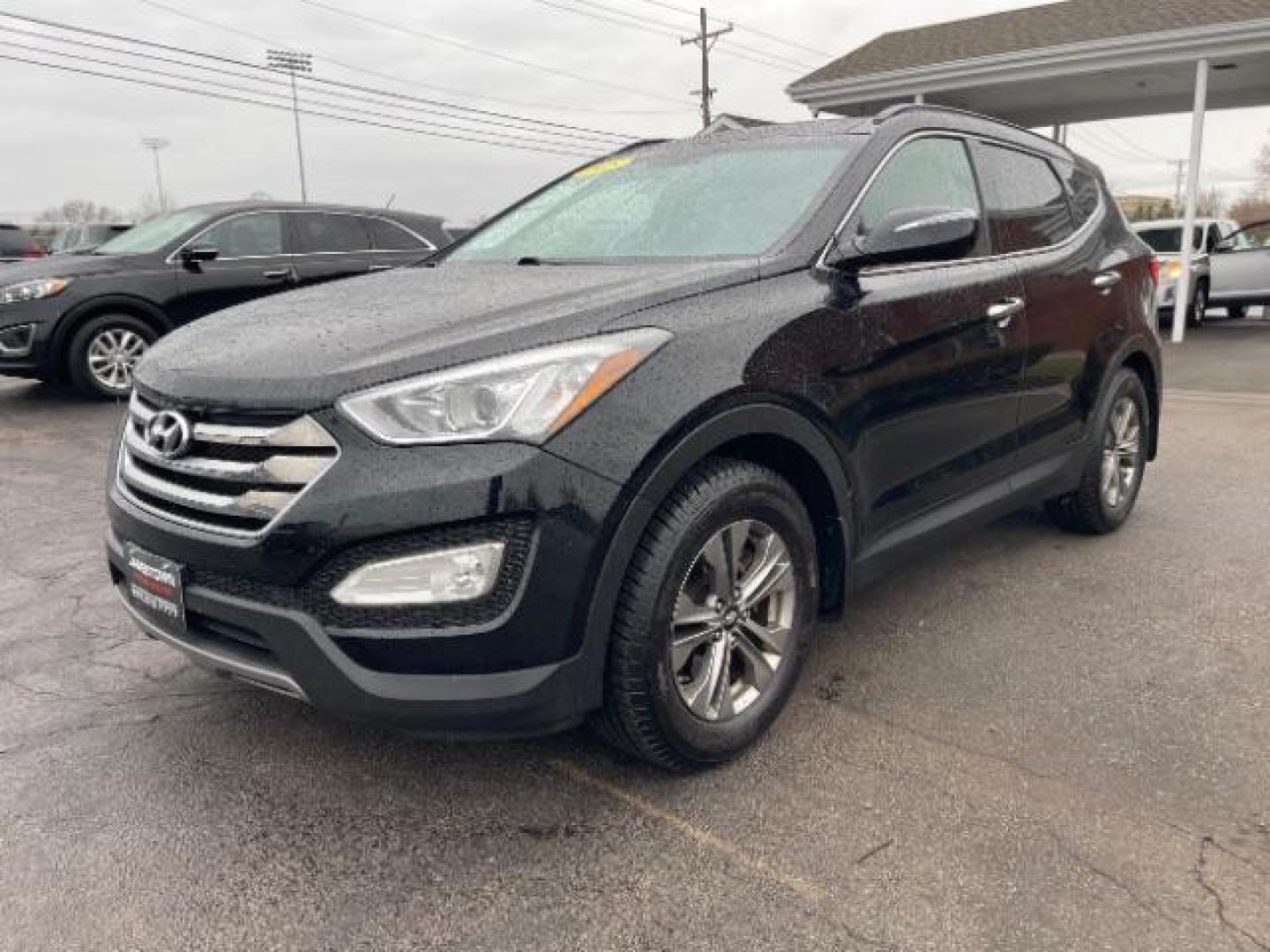 2015 Hyundai Santa Fe Sport 2.4 FWD (5XYZU3LBXFG) with an 2.4L L4 DOHC 16V engine, 6-Speed Automatic transmission, located at 1865 W 2nd St., Xenia, OH, 45385, (937) 372-7777, 39.681259, -83.961945 - 2015 Hyundai Santa Fe Sport 2.4 FWD - Photo#14