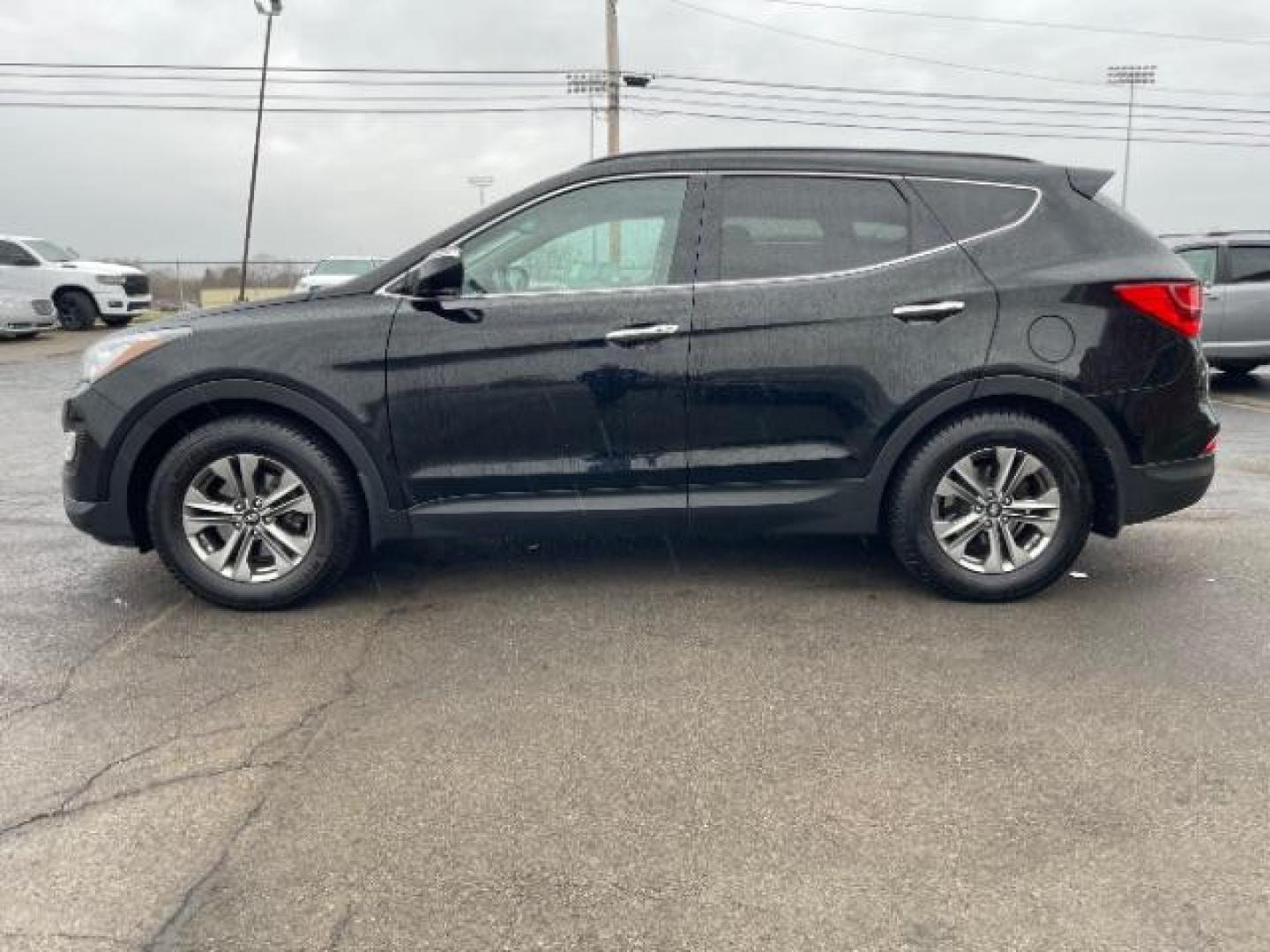 2015 Hyundai Santa Fe Sport 2.4 FWD (5XYZU3LBXFG) with an 2.4L L4 DOHC 16V engine, 6-Speed Automatic transmission, located at 1865 W 2nd St., Xenia, OH, 45385, (937) 372-7777, 39.681259, -83.961945 - 2015 Hyundai Santa Fe Sport 2.4 FWD - Photo#15