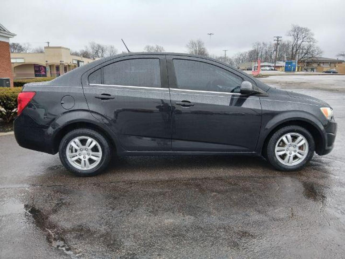 2013 Chevrolet Sonic LT Auto Sedan (1G1JC5SB6D4) with an 1.4L L4 DOHC 24V TURBO engine, 6-Speed Automatic transmission, located at 1865 W 2nd St., Xenia, OH, 45385, (937) 372-7777, 39.681259, -83.961945 - 2013 Chevrolet Sonic LT Auto Sedan - Photo#16