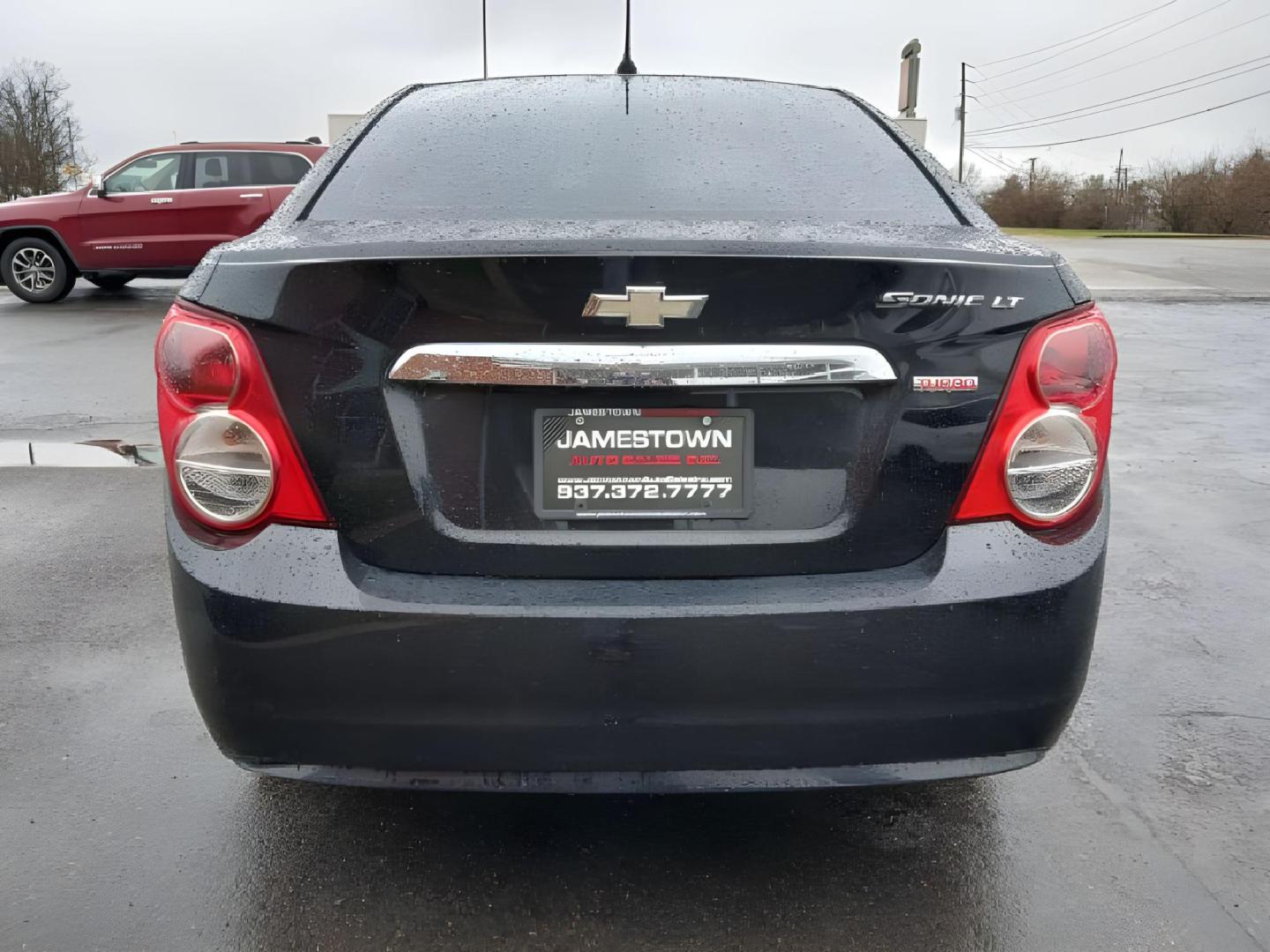 2013 Chevrolet Sonic LT Auto Sedan (1G1JC5SB6D4) with an 1.4L L4 DOHC 24V TURBO engine, 6-Speed Automatic transmission, located at 1865 W 2nd St., Xenia, OH, 45385, (937) 372-7777, 39.681259, -83.961945 - 2013 Chevrolet Sonic LT Auto Sedan - Photo#5