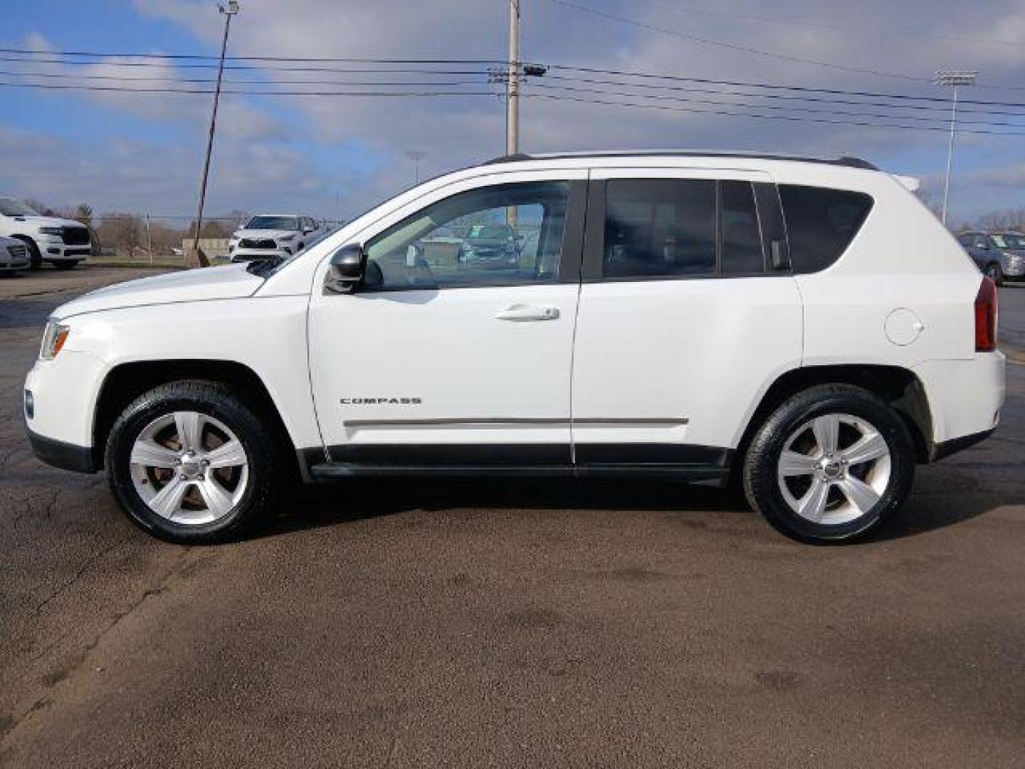 2014 Jeep Compass Sport 4WD (1C4NJDBB0ED) with an 2.4L L4 DOHC 16V engine, located at 1865 W 2nd St., Xenia, OH, 45385, (937) 372-7777, 39.681259, -83.961945 - 2014 Jeep Compass Sport 4WD - Photo#15