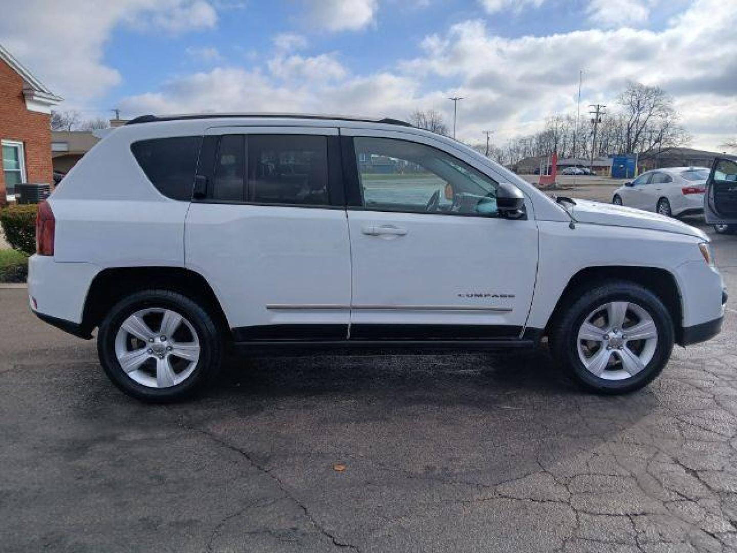 2014 Jeep Compass Sport 4WD (1C4NJDBB0ED) with an 2.4L L4 DOHC 16V engine, located at 1865 W 2nd St., Xenia, OH, 45385, (937) 372-7777, 39.681259, -83.961945 - 2014 Jeep Compass Sport 4WD - Photo#16