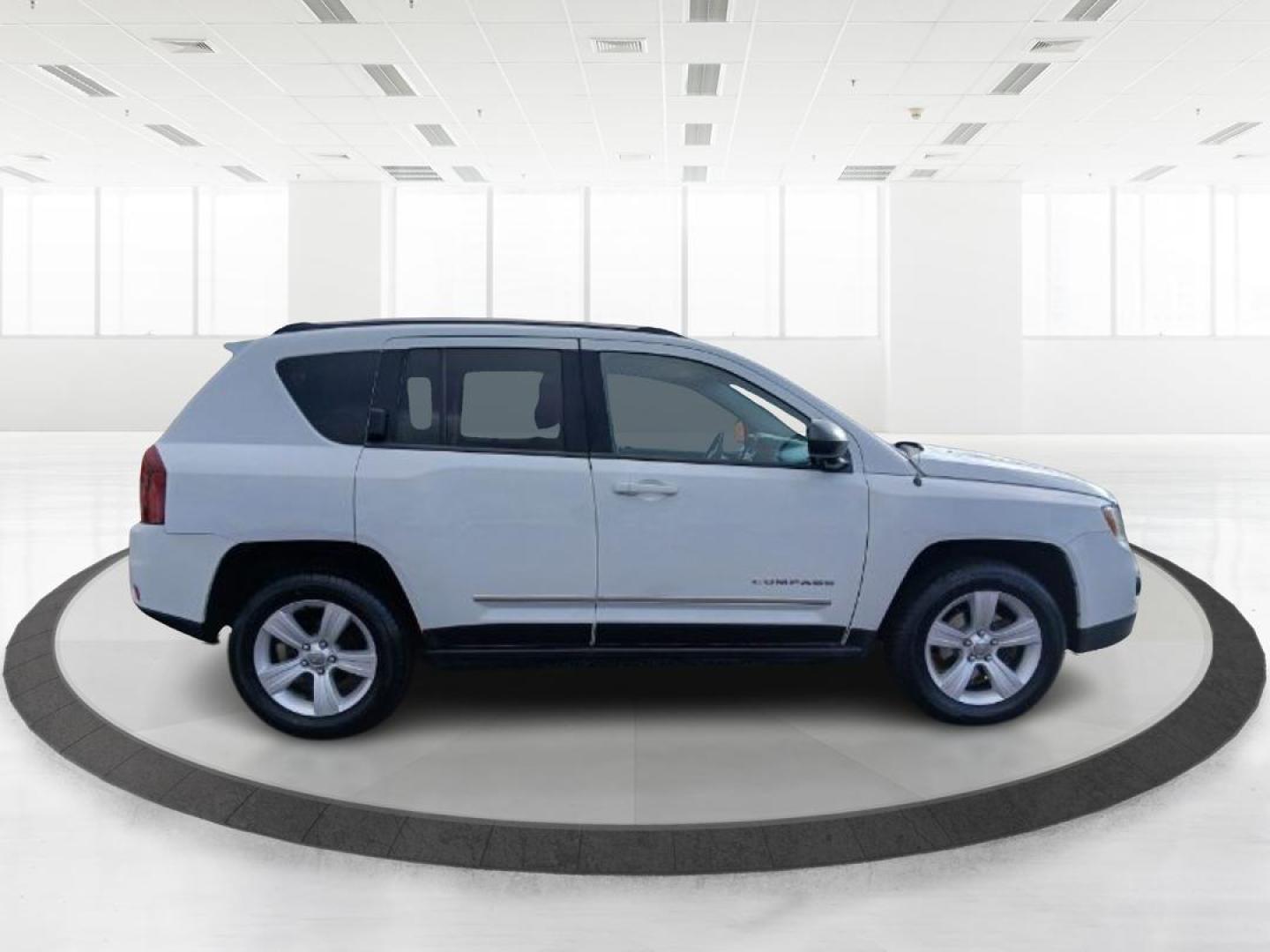 2014 Jeep Compass Sport 4WD (1C4NJDBB0ED) with an 2.4L L4 DOHC 16V engine, located at 1865 W 2nd St., Xenia, OH, 45385, (937) 372-7777, 39.681259, -83.961945 - 2014 Jeep Compass Sport 4WD - Photo#1