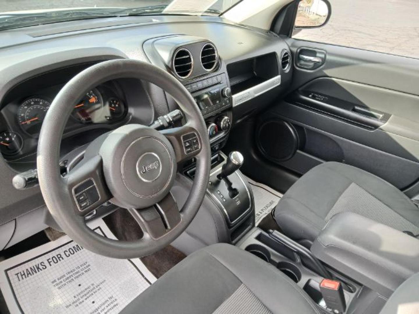 2014 Jeep Compass Sport 4WD (1C4NJDBB0ED) with an 2.4L L4 DOHC 16V engine, located at 1865 W 2nd St., Xenia, OH, 45385, (937) 372-7777, 39.681259, -83.961945 - 2014 Jeep Compass Sport 4WD - Photo#6