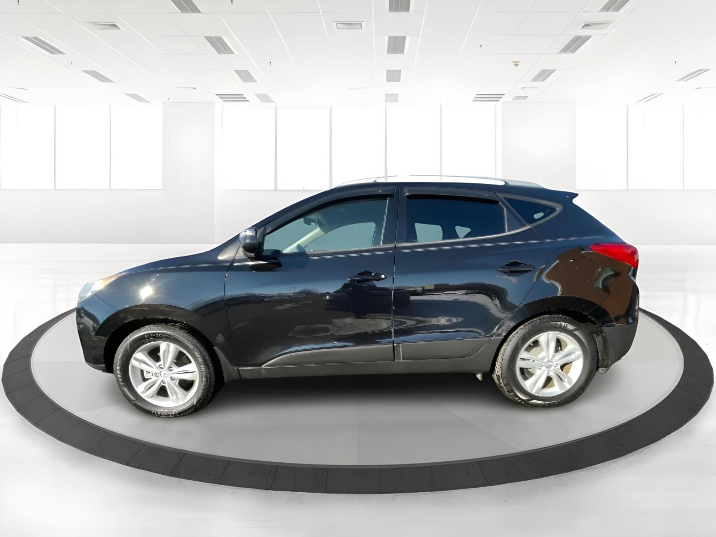 2012 Hyundai Tucson GLS AWD (KM8JUCAC7CU) with an 2.4L L4 DOHC 16V engine, 6-Speed Automatic transmission, located at 1865 W 2nd St., Xenia, OH, 45385, (937) 372-7777, 39.681259, -83.961945 - 2012 Hyundai Tucson GLS AWD - Photo#16