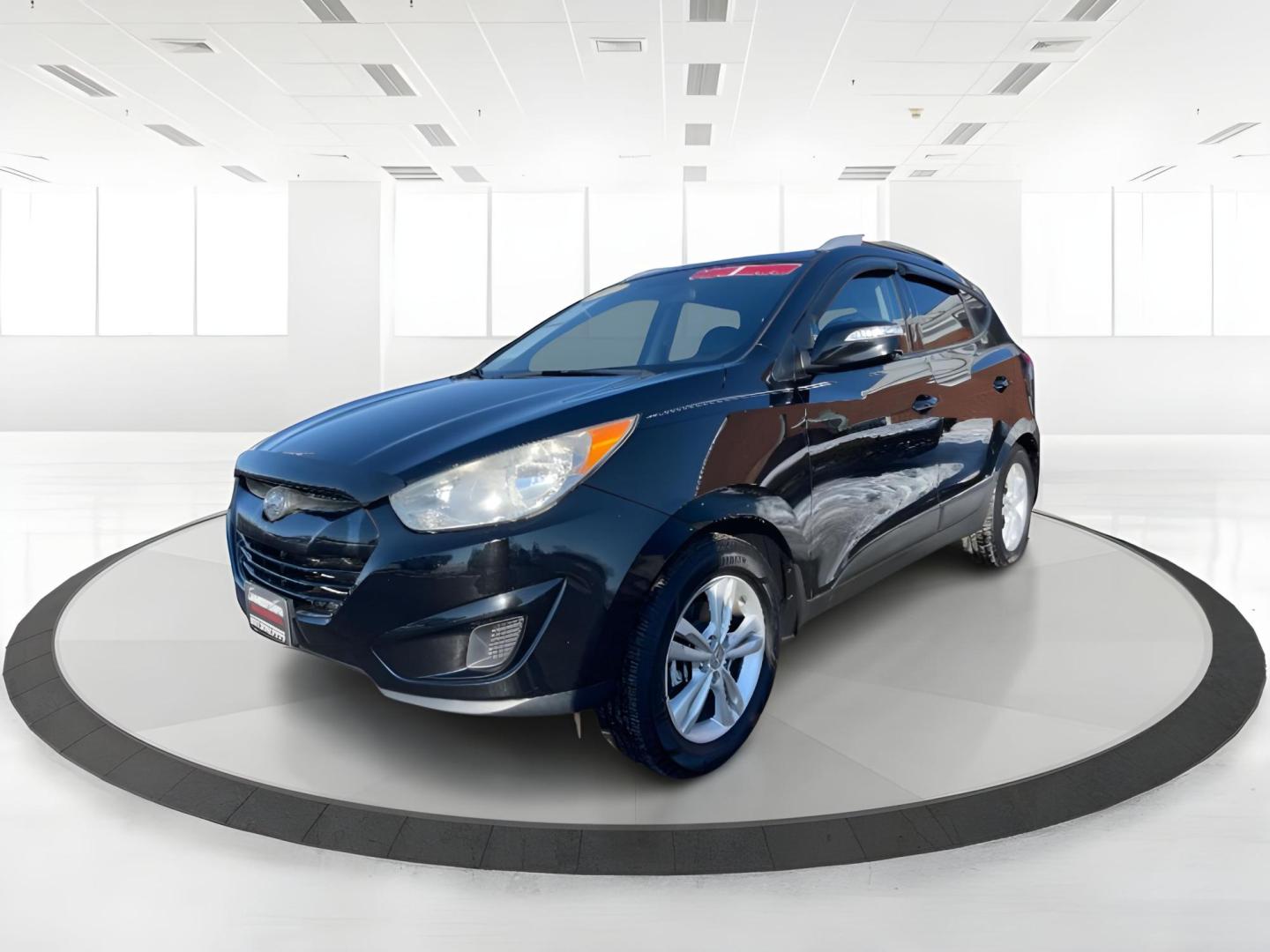 2012 Hyundai Tucson GLS AWD (KM8JUCAC7CU) with an 2.4L L4 DOHC 16V engine, 6-Speed Automatic transmission, located at 1865 W 2nd St., Xenia, OH, 45385, (937) 372-7777, 39.681259, -83.961945 - 2012 Hyundai Tucson GLS AWD - Photo#18