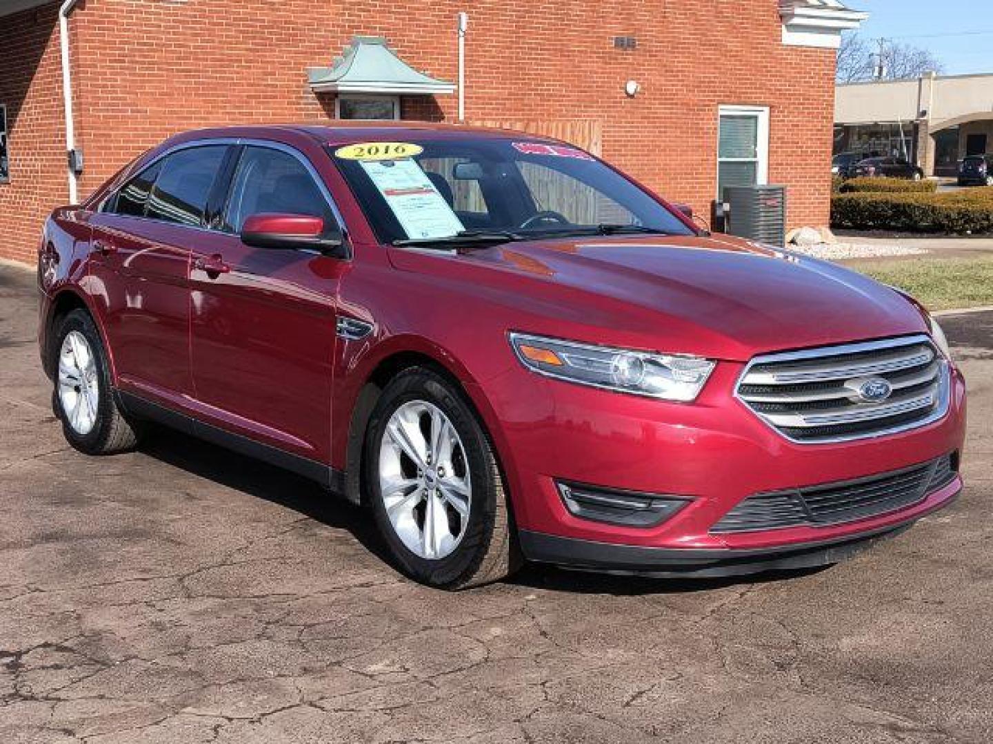 2016 Ford Taurus SEL FWD (1FAHP2E8XGG) with an 3.5L V6 DOHC 24V engine, 6-Speed Automatic transmission, located at 1865 W 2nd St., Xenia, OH, 45385, (937) 372-7777, 39.681259, -83.961945 - 2016 Ford Taurus SEL FWD - Photo#0