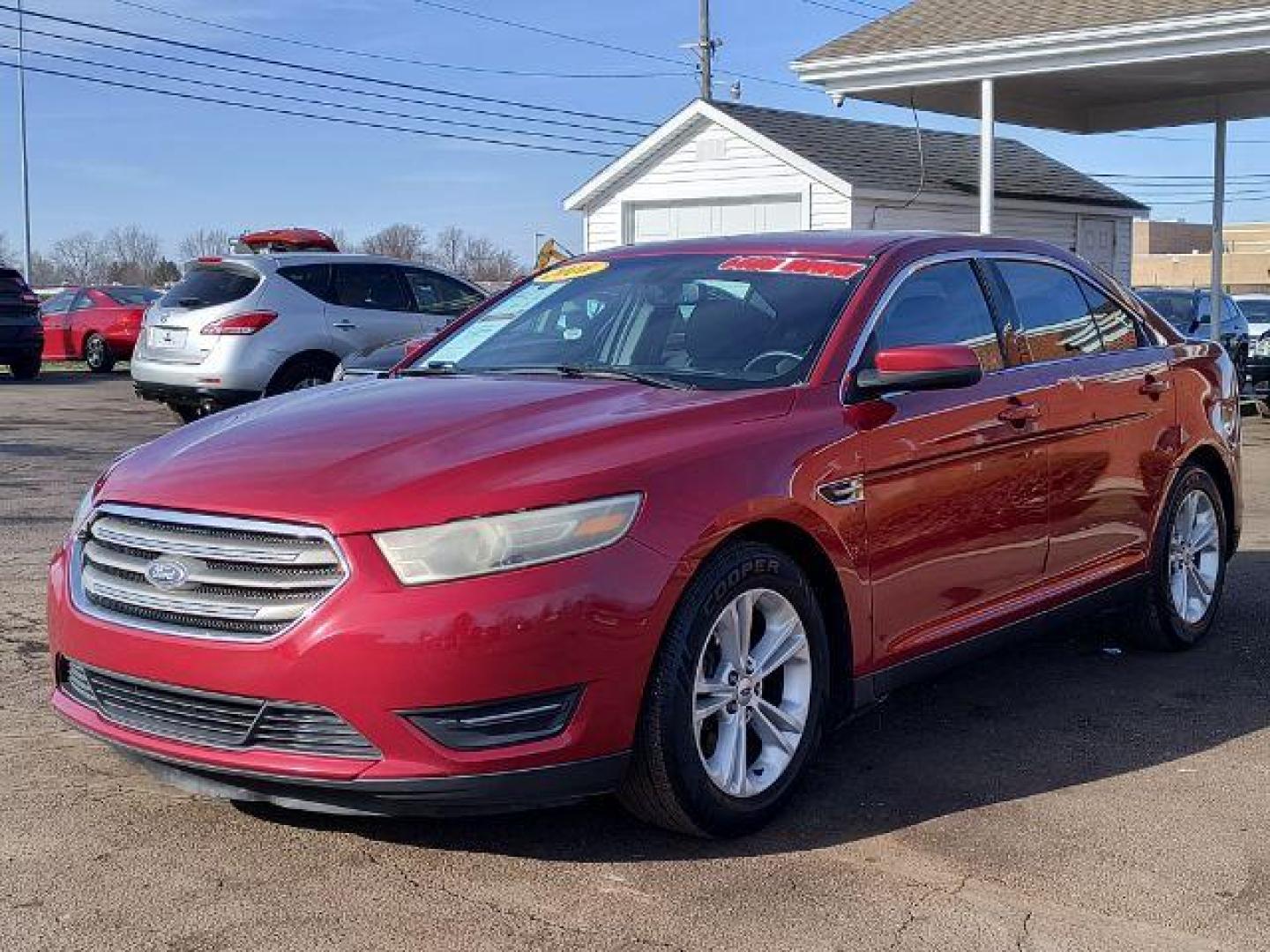 2016 Ford Taurus SEL FWD (1FAHP2E8XGG) with an 3.5L V6 DOHC 24V engine, 6-Speed Automatic transmission, located at 1865 W 2nd St., Xenia, OH, 45385, (937) 372-7777, 39.681259, -83.961945 - 2016 Ford Taurus SEL FWD - Photo#1