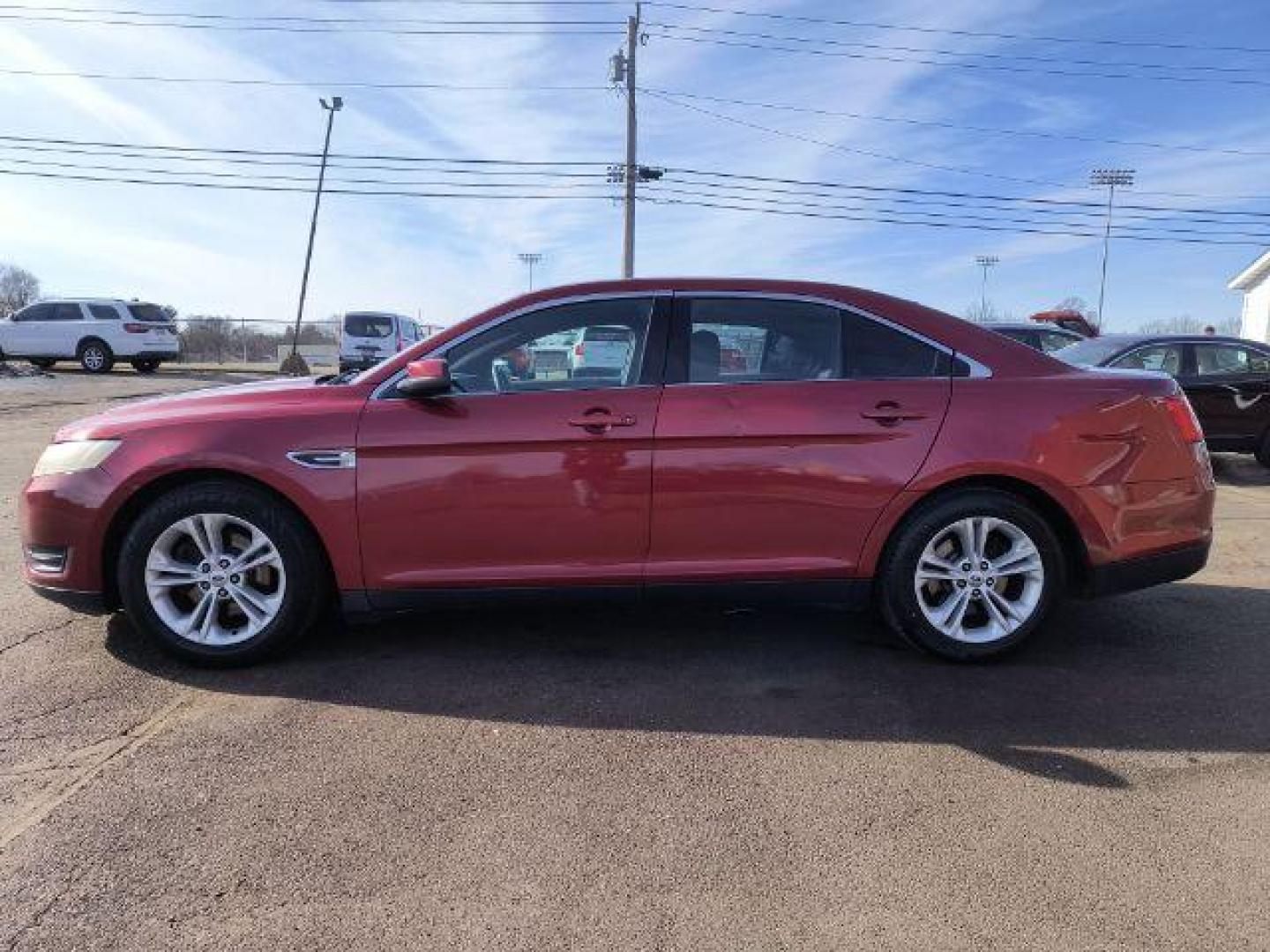 2016 Ford Taurus SEL FWD (1FAHP2E8XGG) with an 3.5L V6 DOHC 24V engine, 6-Speed Automatic transmission, located at 1865 W 2nd St., Xenia, OH, 45385, (937) 372-7777, 39.681259, -83.961945 - 2016 Ford Taurus SEL FWD - Photo#2