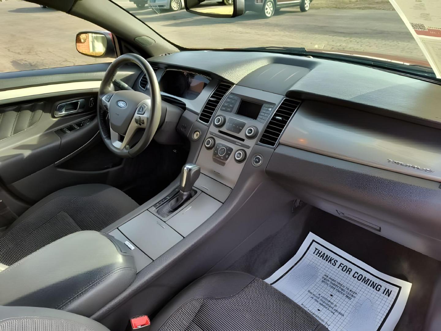 2016 Ford Taurus SEL FWD (1FAHP2E8XGG) with an 3.5L V6 DOHC 24V engine, 6-Speed Automatic transmission, located at 1865 W 2nd St., Xenia, OH, 45385, (937) 372-7777, 39.681259, -83.961945 - 2016 Ford Taurus SEL FWD - Photo#21