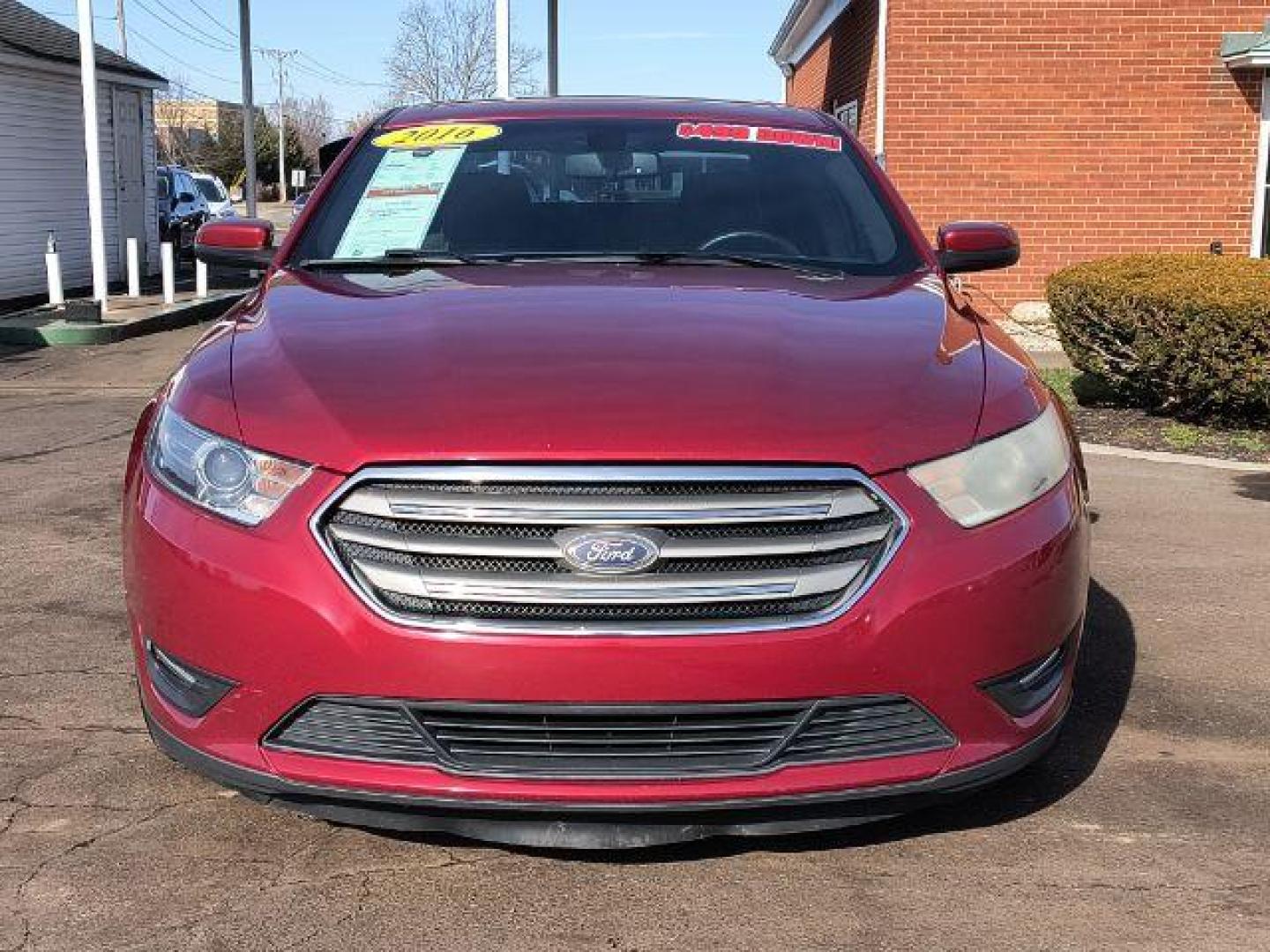 2016 Ford Taurus SEL FWD (1FAHP2E8XGG) with an 3.5L V6 DOHC 24V engine, 6-Speed Automatic transmission, located at 1865 W 2nd St., Xenia, OH, 45385, (937) 372-7777, 39.681259, -83.961945 - 2016 Ford Taurus SEL FWD - Photo#4