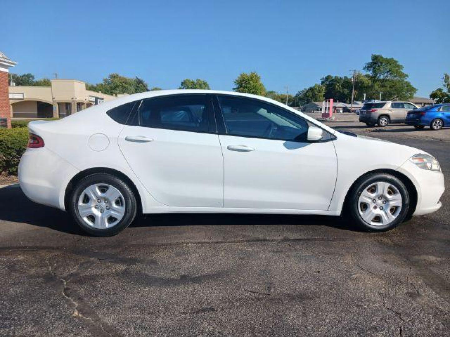 2015 Bright White Clearcoat Dodge Dart SE (1C3CDFAA8FD) with an 2.0L L4 DOHC 16V TURBO engine, located at 1865 W 2nd St., Xenia, OH, 45385, (937) 372-7777, 39.681259, -83.961945 - Photo#4