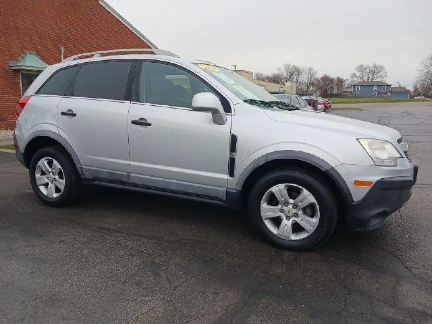 2014 Silver Chevrolet Captiva Sport 2LS FWD (3GNAL2EKXES) with an 2.4L L4 DOHC 16V FFV engine, 6-Speed Automatic transmission, located at 1865 W 2nd St., Xenia, OH, 45385, (937) 372-7777, 39.681259, -83.961945 - Photo#0