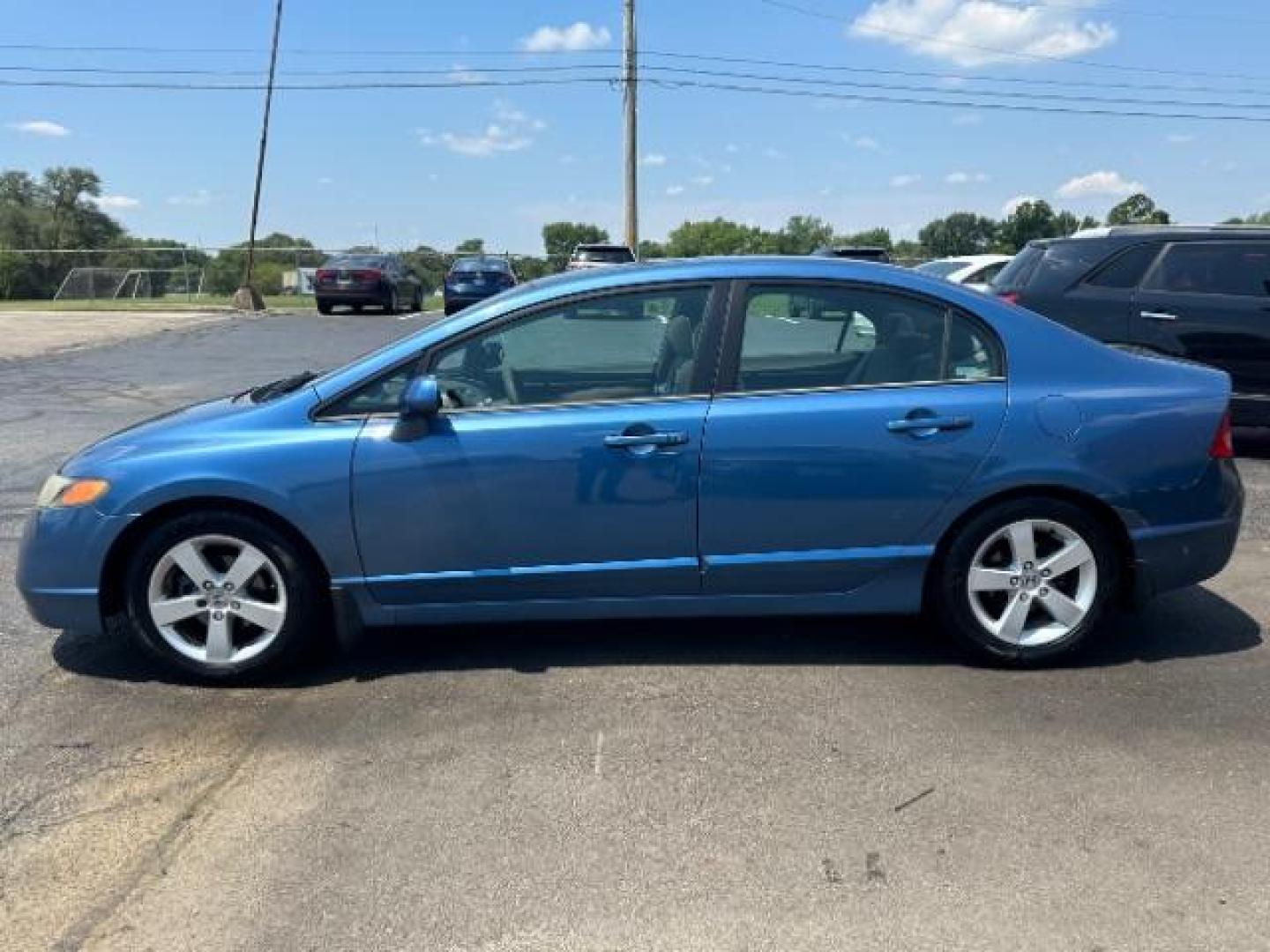 2006 Royal Blue Pearl Honda Civic EX Sedan AT (1HGFA16876L) with an 1.8L L4 SOHC 16V engine, 5-Speed Automatic transmission, located at 1865 W 2nd St., Xenia, OH, 45385, (937) 372-7777, 39.681259, -83.961945 - Photo#3