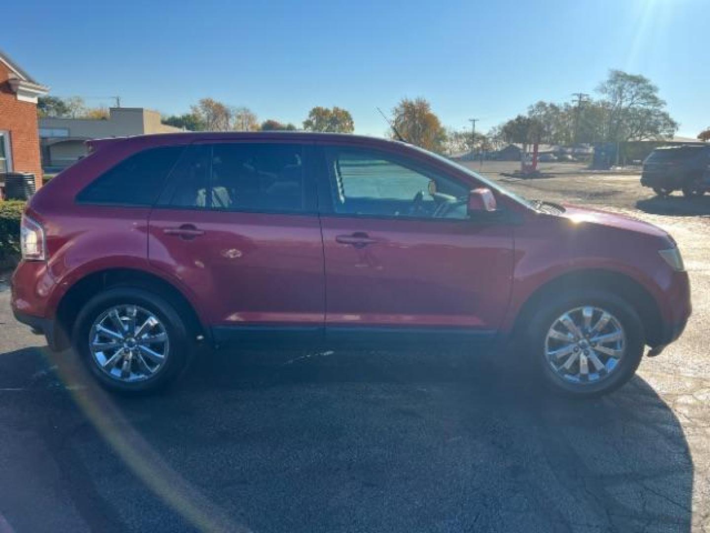 2007 Redfire Metallic Ford Edge SEL Plus AWD (2FMDK49C57B) with an 3.5L V6 DOHC 24V engine, 6-Speed Automatic transmission, located at 1865 W 2nd St., Xenia, OH, 45385, (937) 372-7777, 39.681259, -83.961945 - Photo#5