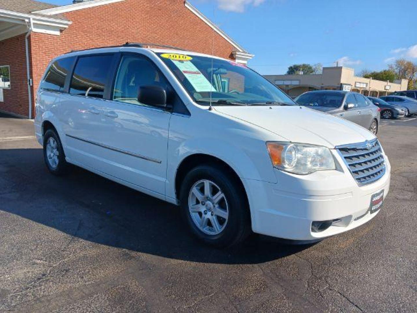 2010 White Gold Pearl Chrysler Town and Country Touring (2A4RR5D11AR) with an 3.8L V6 OHV 12V engine, 6-Speed Automatic transmission, located at 1865 W 2nd St., Xenia, OH, 45385, (937) 372-7777, 39.681259, -83.961945 - Photo#0