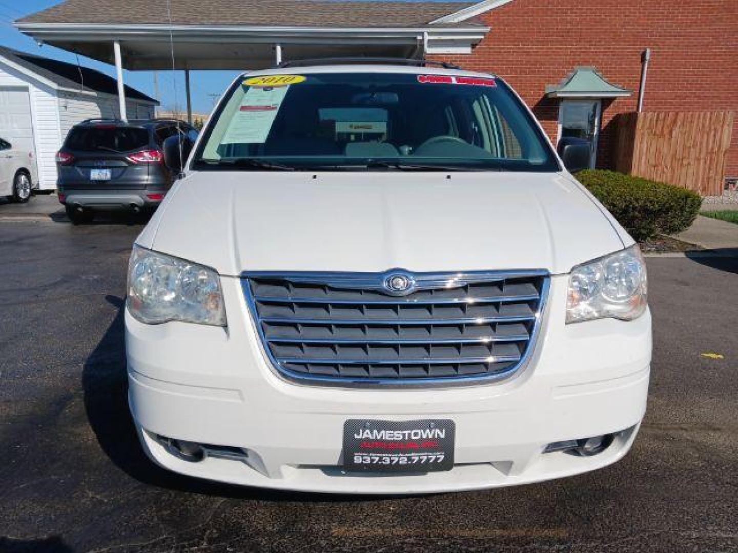 2010 White Gold Pearl Chrysler Town and Country Touring (2A4RR5D11AR) with an 3.8L V6 OHV 12V engine, 6-Speed Automatic transmission, located at 1865 W 2nd St., Xenia, OH, 45385, (937) 372-7777, 39.681259, -83.961945 - Photo#1