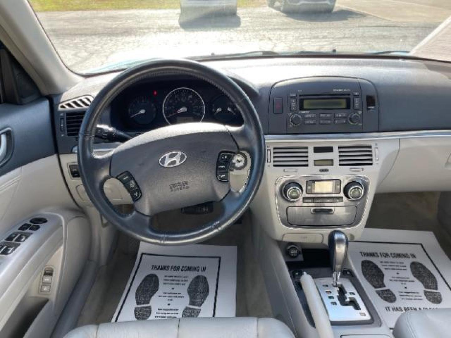 2006 Deepwater Blue Hyundai Sonata LX (5NPEU46F96H) with an 3.3L V6 DOHC 24V engine, 5-Speed Automatic transmission, located at 1865 W 2nd St., Xenia, OH, 45385, (937) 372-7777, 39.681259, -83.961945 - Photo#6