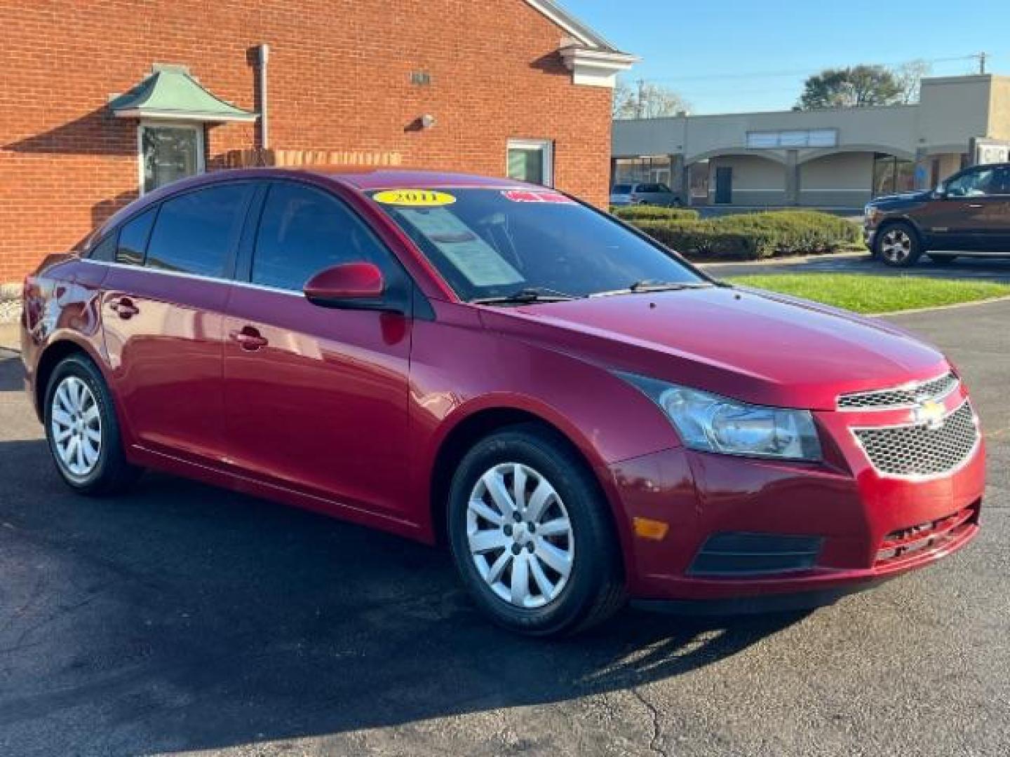 2011 Crystal Red Metallic Chevrolet Cruze 1LT (1G1PF5S93B7) with an 1.4L L4 DOHC 16V TURBO engine, 6-Speed Automatic transmission, located at 1865 W 2nd St., Xenia, OH, 45385, (937) 372-7777, 39.681259, -83.961945 - Photo#0