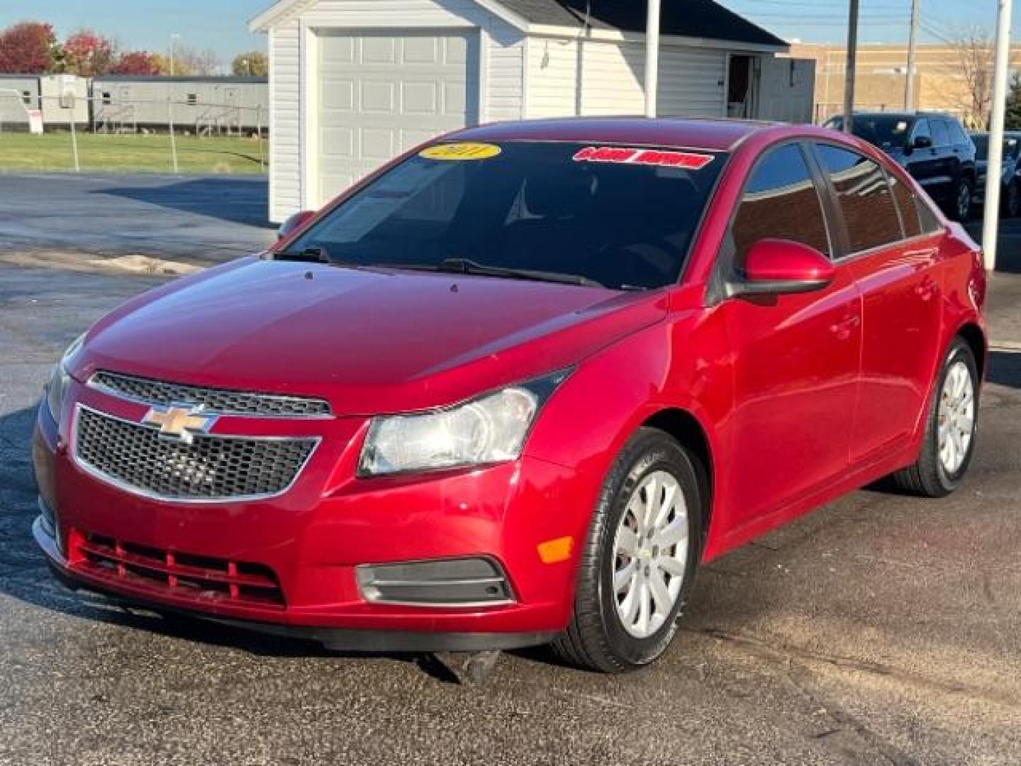 2011 Crystal Red Metallic Chevrolet Cruze 1LT (1G1PF5S93B7) with an 1.4L L4 DOHC 16V TURBO engine, 6-Speed Automatic transmission, located at 1865 W 2nd St., Xenia, OH, 45385, (937) 372-7777, 39.681259, -83.961945 - Photo#2