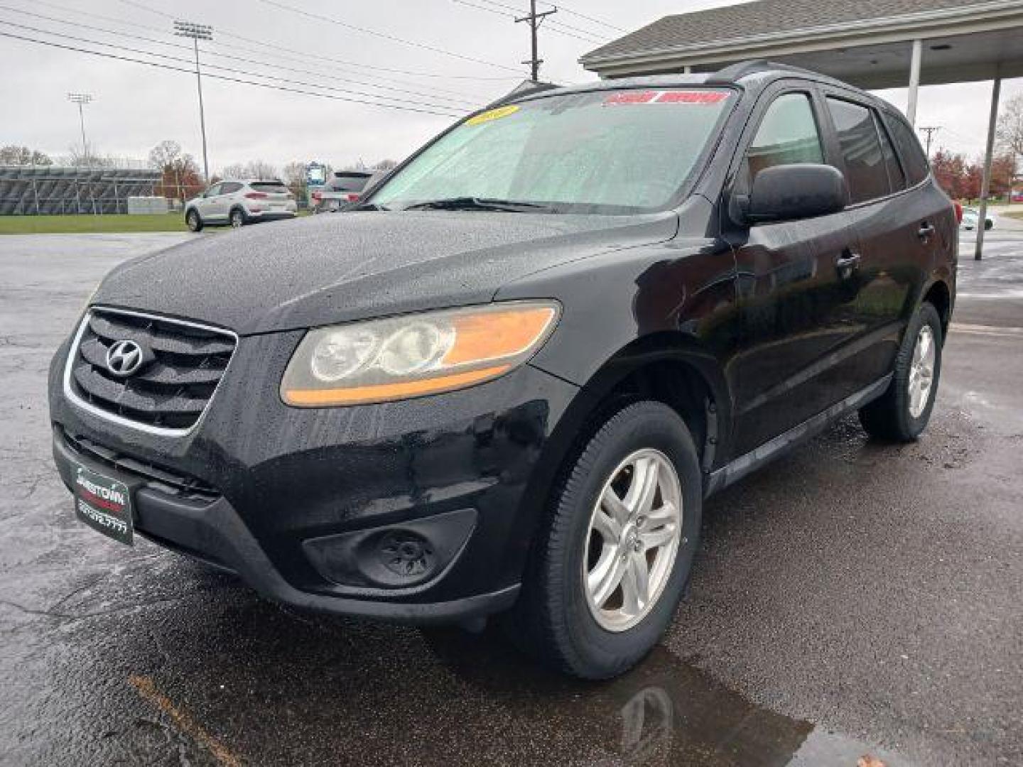 2010 Phantom Black Metallic Hyundai Santa Fe GLS 2.4 FWD (5NMSG3AB7AH) with an 2.4L L4 DOHC 16V engine, 6-Speed Automatic transmission, located at 1865 W 2nd St., Xenia, OH, 45385, (937) 372-7777, 39.681259, -83.961945 - Photo#2