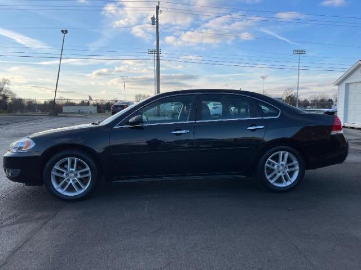 2011 Black Chevrolet Impala LTZ (2G1WC5EM1B1) with an 3.9L V6 DOHC 16V FFV engine, 4-Speed Automatic transmission, located at 1865 W 2nd St., Xenia, OH, 45385, (937) 372-7777, 39.681259, -83.961945 - Photo#2