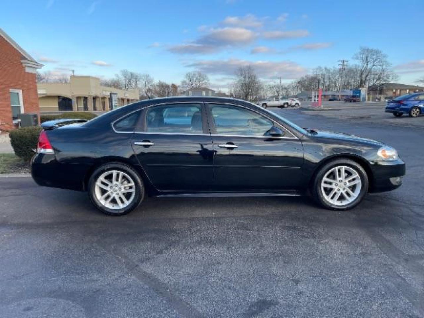 2011 Black Chevrolet Impala LTZ (2G1WC5EM1B1) with an 3.9L V6 DOHC 16V FFV engine, 4-Speed Automatic transmission, located at 1865 W 2nd St., Xenia, OH, 45385, (937) 372-7777, 39.681259, -83.961945 - Photo#3