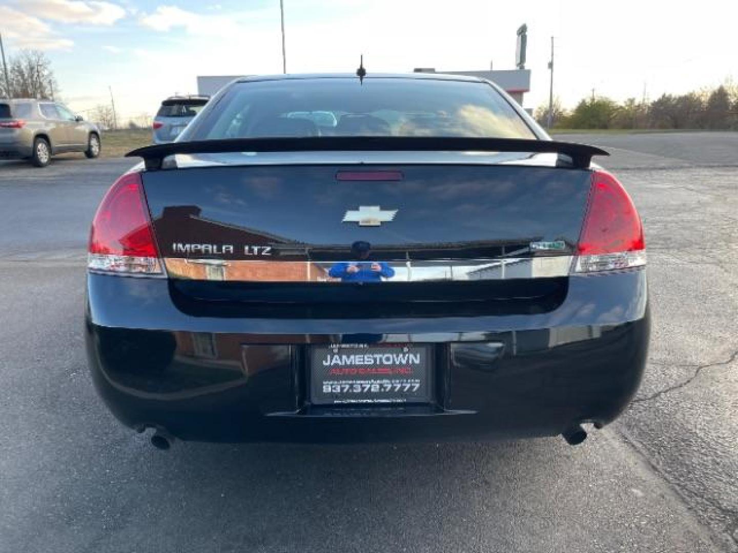 2011 Black Chevrolet Impala LTZ (2G1WC5EM1B1) with an 3.9L V6 DOHC 16V FFV engine, 4-Speed Automatic transmission, located at 1865 W 2nd St., Xenia, OH, 45385, (937) 372-7777, 39.681259, -83.961945 - Photo#5