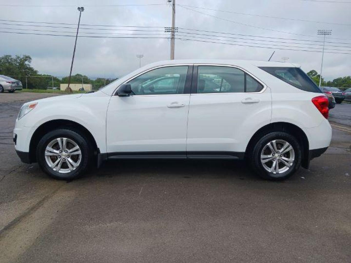 2015 Summit White Chevrolet Equinox LS 2WD (2GNALAEK4F1) with an 2.4L L4 DOHC 16V FFV engine, 6-Speed Automatic transmission, located at 1865 W 2nd St., Xenia, OH, 45385, (937) 372-7777, 39.681259, -83.961945 - Photo#2