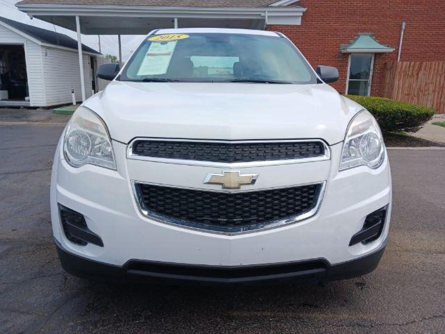 2015 Summit White Chevrolet Equinox LS 2WD (2GNALAEK4F1) with an 2.4L L4 DOHC 16V FFV engine, 6-Speed Automatic transmission, located at 1865 W 2nd St., Xenia, OH, 45385, (937) 372-7777, 39.681259, -83.961945 - Photo#4