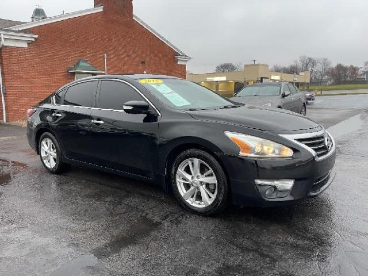 2015 Super Black Nissan Altima 2.5 SL (1N4AL3AP6FN) with an 2.5L L4 DOHC 16V engine, Continuously Variable Transmission transmission, located at 1865 W 2nd St., Xenia, OH, 45385, (937) 372-7777, 39.681259, -83.961945 - Photo#0