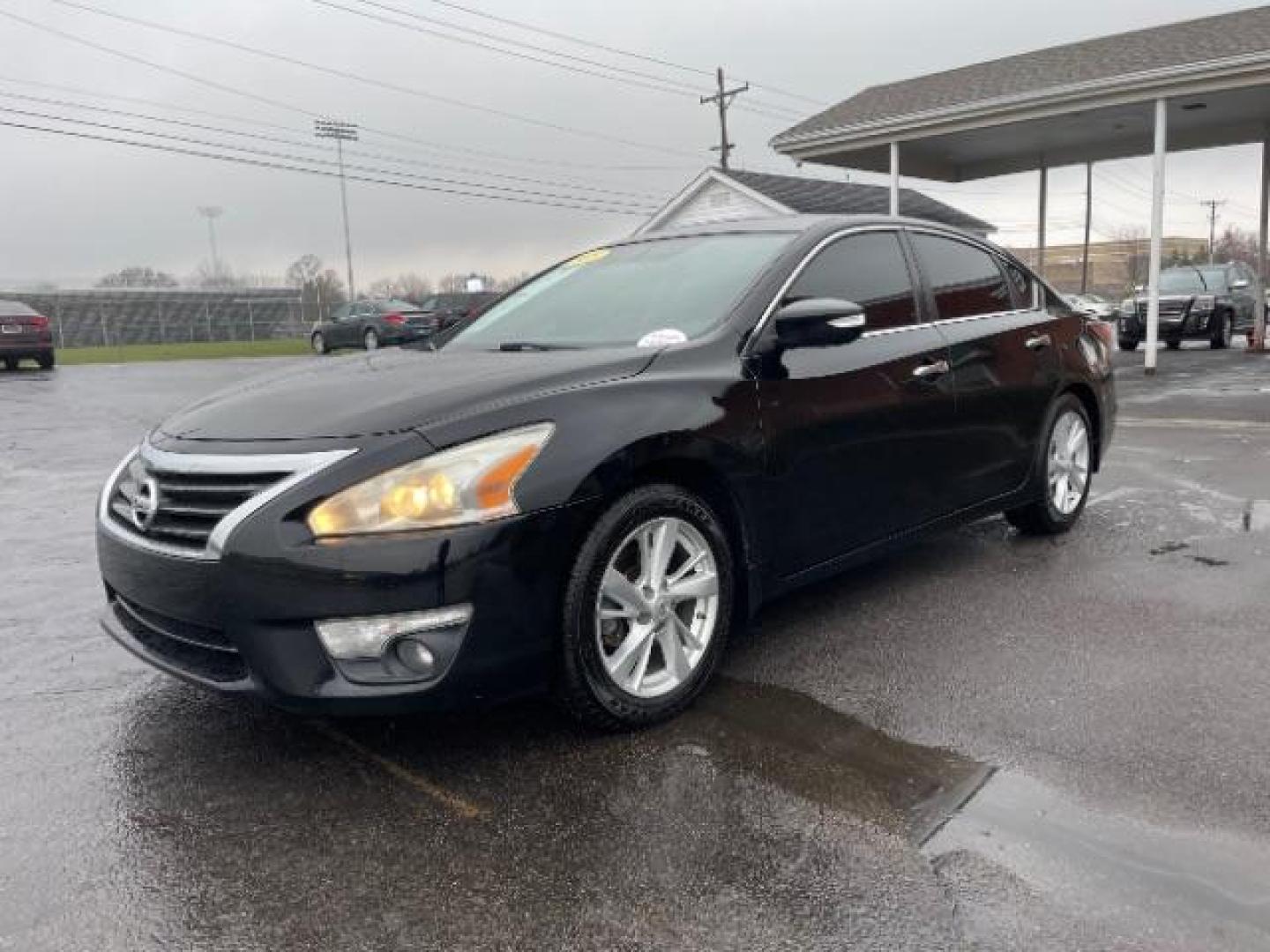 2015 Super Black Nissan Altima 2.5 SL (1N4AL3AP6FN) with an 2.5L L4 DOHC 16V engine, Continuously Variable Transmission transmission, located at 1865 W 2nd St., Xenia, OH, 45385, (937) 372-7777, 39.681259, -83.961945 - Photo#1