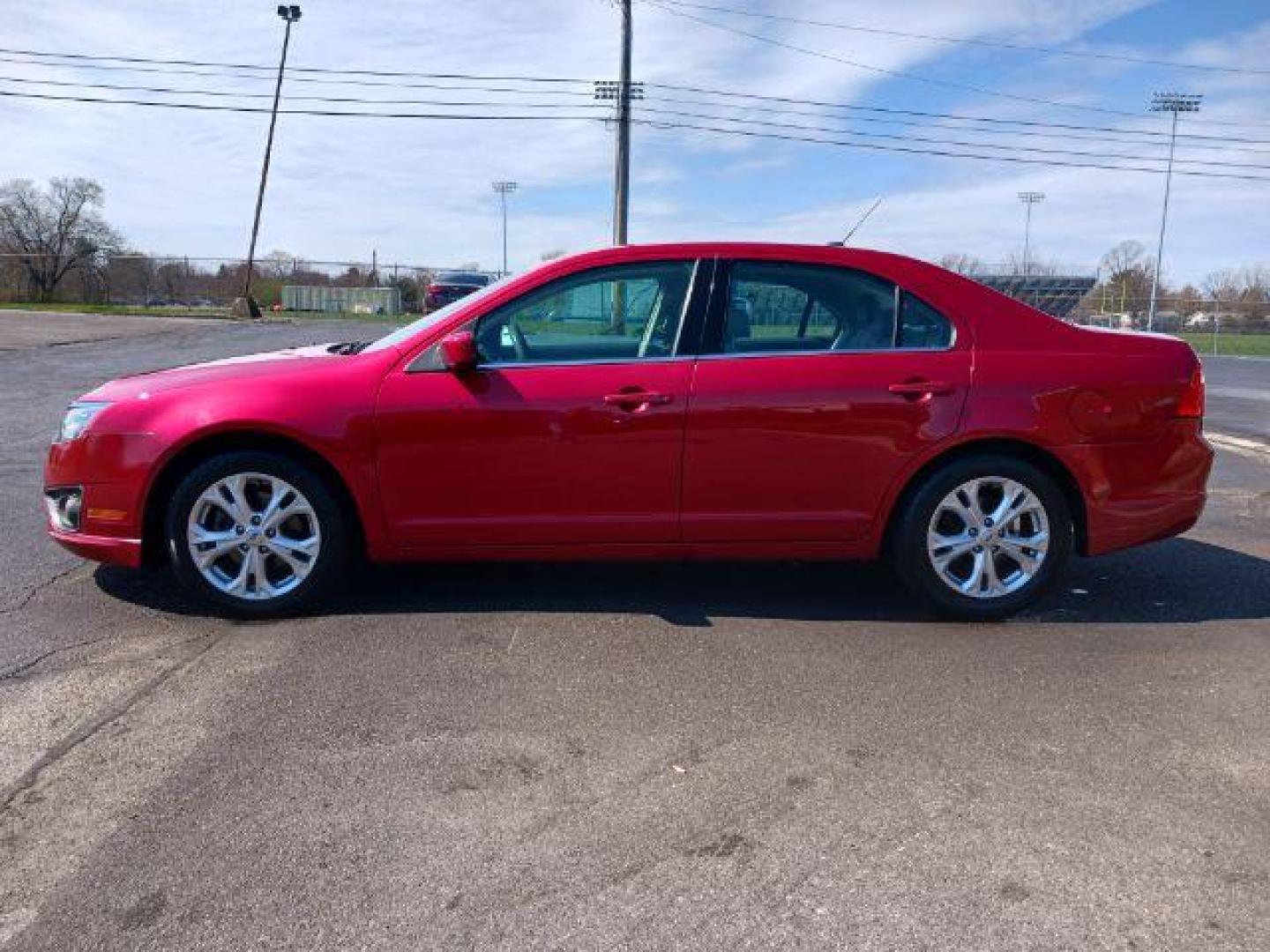 2012 Red Candy Metallic Ford Fusion SE (3FAHP0HA2CR) with an 2.5L L4 DOHC 16V engine, located at 1865 W 2nd St., Xenia, OH, 45385, (937) 372-7777, 39.681259, -83.961945 - Photo#3