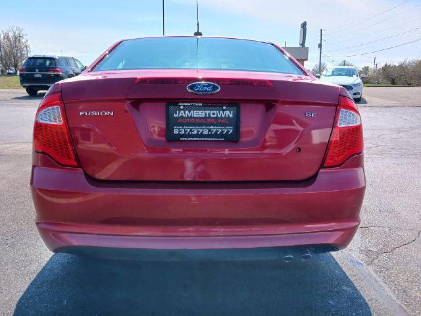 2012 Red Candy Metallic Ford Fusion SE (3FAHP0HA2CR) with an 2.5L L4 DOHC 16V engine, located at 1865 W 2nd St., Xenia, OH, 45385, (937) 372-7777, 39.681259, -83.961945 - Photo#5