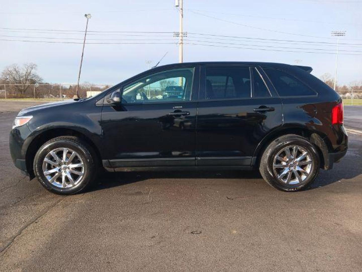 2012 Tuxedo Black Metallic Ford Edge SEL FWD (2FMDK3JC9CB) with an 3.5L V6 DOHC 24V engine, 6-Speed Automatic transmission, located at 1865 W 2nd St., Xenia, OH, 45385, (937) 372-7777, 39.681259, -83.961945 - Photo#3