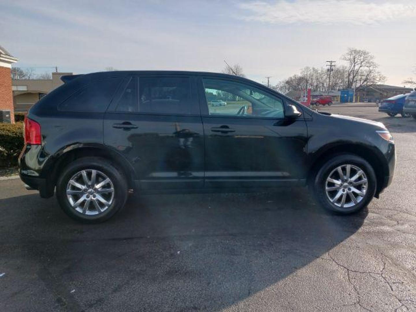 2012 Tuxedo Black Metallic Ford Edge SEL FWD (2FMDK3JC9CB) with an 3.5L V6 DOHC 24V engine, 6-Speed Automatic transmission, located at 1865 W 2nd St., Xenia, OH, 45385, (937) 372-7777, 39.681259, -83.961945 - Photo#4