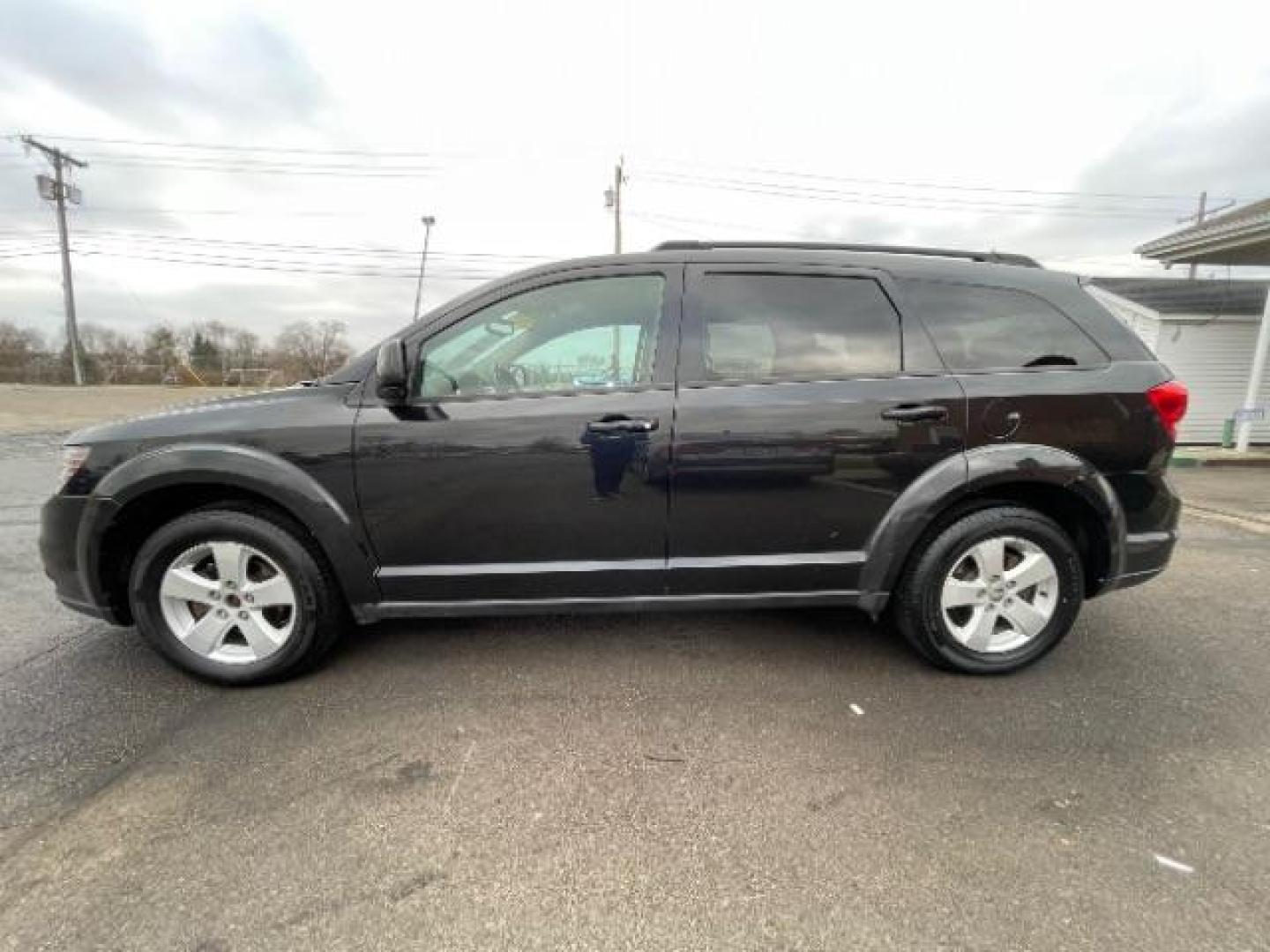 2012 Brilliant Black Crystal Pearl Dodge Journey SXT AWD (3C4PDDBG8CT) with an 3.6L V6 DOHC 24V engine, 6-Speed Automatic transmission, located at 1865 W 2nd St., Xenia, OH, 45385, (937) 372-7777, 39.681259, -83.961945 - Third Row - Photo#2