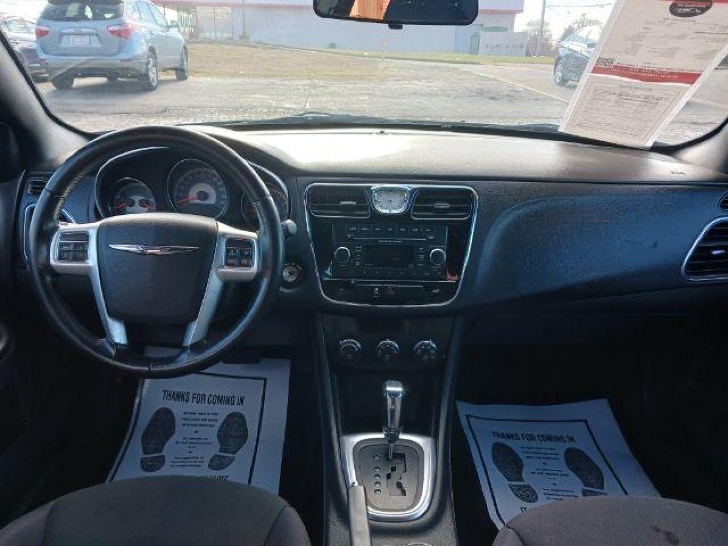 2012 Black Chrysler 200 Touring (1C3CCBBB4CN) with an 2.4L L4 DOHC 16V engine, 6-Speed Automatic transmission, located at 1865 W 2nd St., Xenia, OH, 45385, (937) 372-7777, 39.681259, -83.961945 - Photo#7