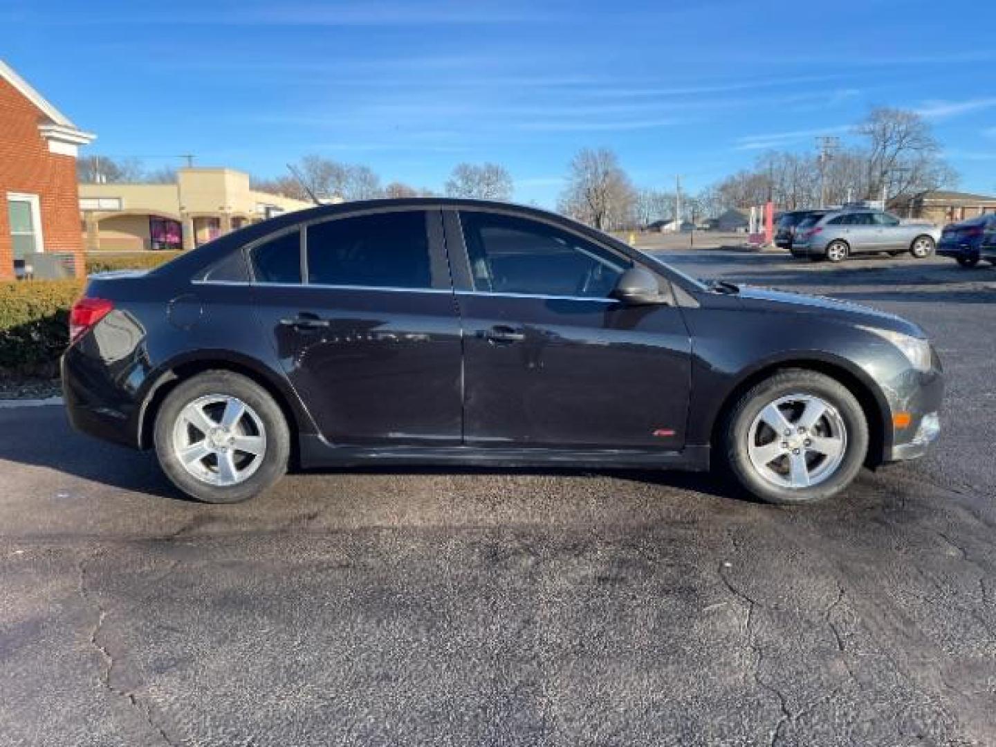 2011 Black Granite Metallic Chevrolet Cruze 1LT (1G1PF5S96B7) with an 1.4L L4 DOHC 16V TURBO engine, 6-Speed Automatic transmission, located at 1865 W 2nd St., Xenia, OH, 45385, (937) 372-7777, 39.681259, -83.961945 - Photo#4