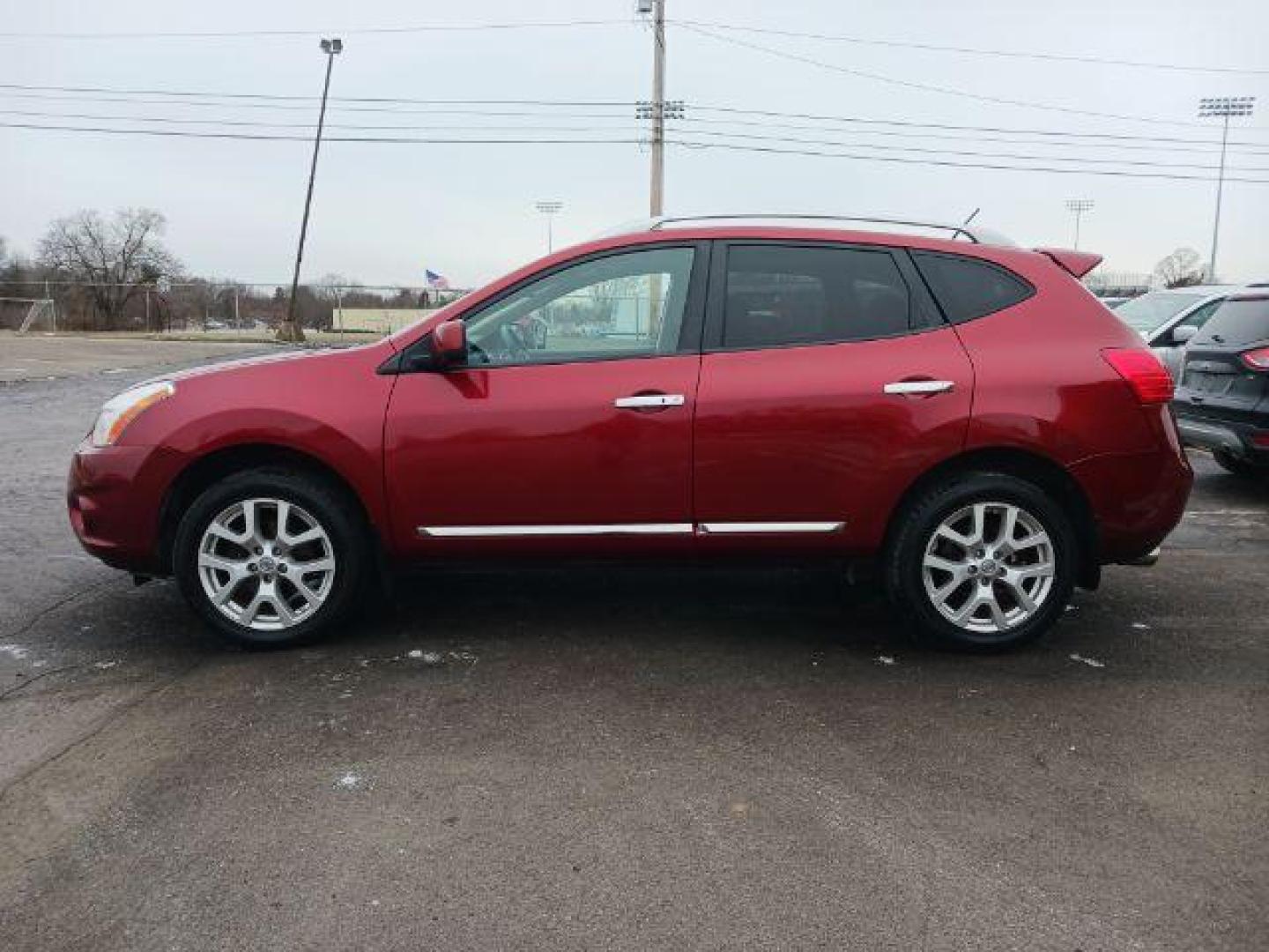 2012 Cayenne Red Pearl Nissan Rogue S AWD (JN8AS5MV8CW) with an 2.5L L4 DOHC 16V engine, Continuously Variable Transmission transmission, located at 1865 W 2nd St., Xenia, OH, 45385, (937) 372-7777, 39.681259, -83.961945 - Photo#3