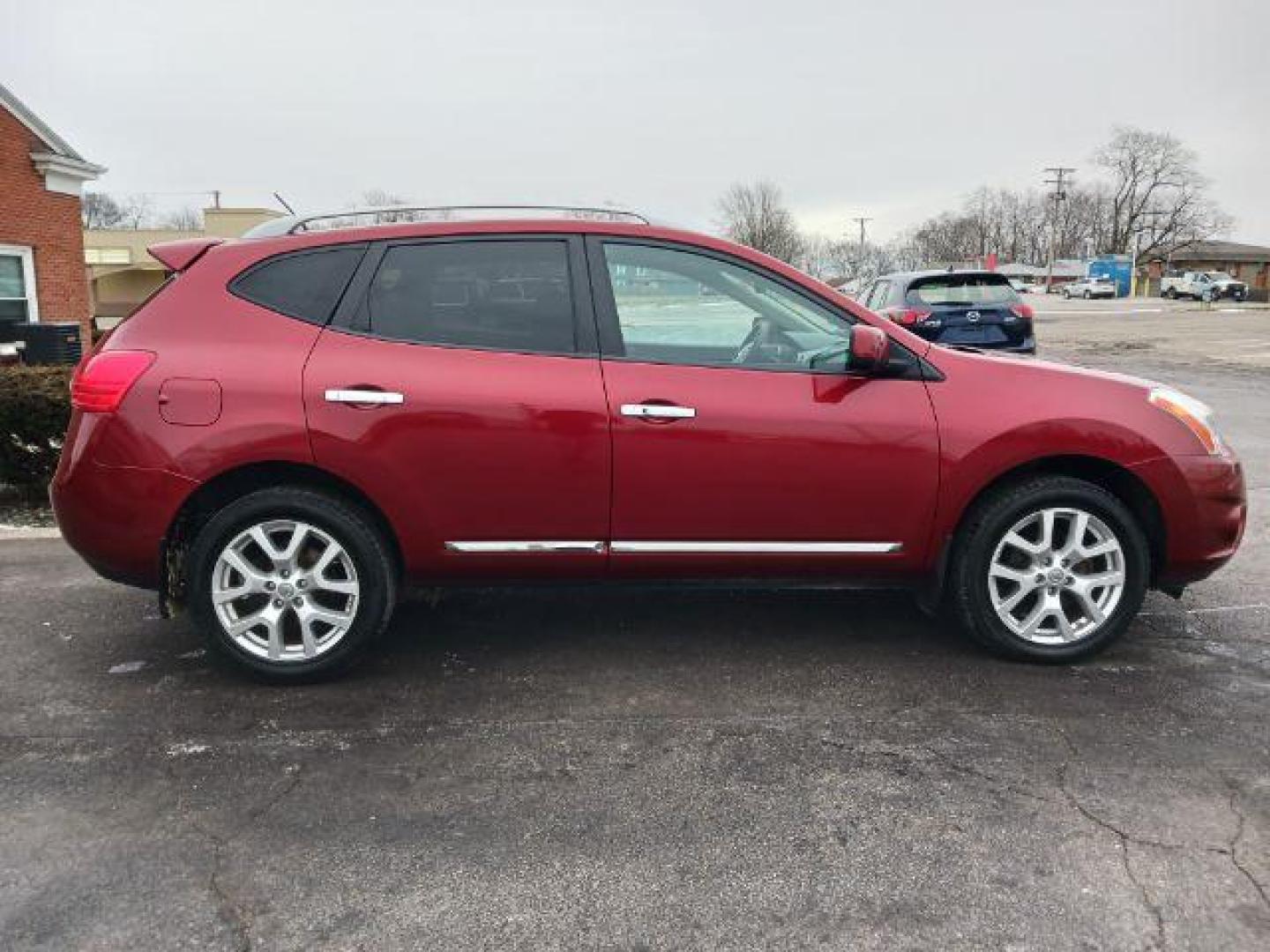 2012 Cayenne Red Pearl Nissan Rogue S AWD (JN8AS5MV8CW) with an 2.5L L4 DOHC 16V engine, Continuously Variable Transmission transmission, located at 1865 W 2nd St., Xenia, OH, 45385, (937) 372-7777, 39.681259, -83.961945 - Photo#4