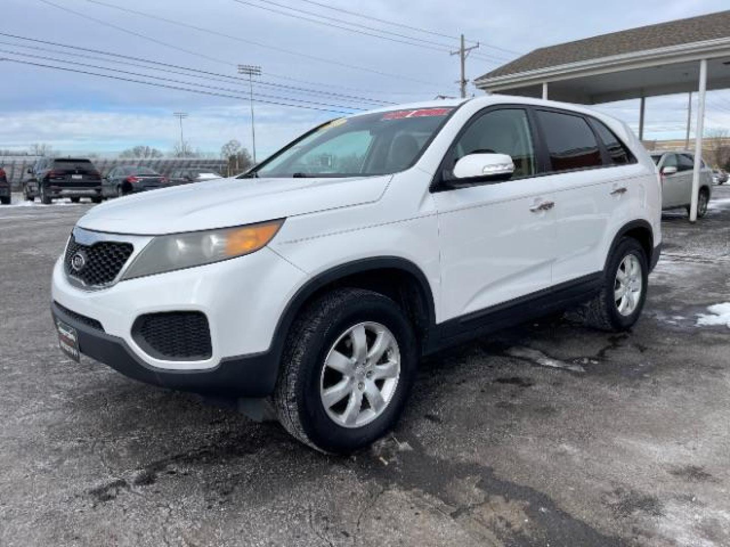 2011 Snow White Pearl Kia Sorento LX 2WD (5XYKT3A14BG) with an 2.4L L4 DOHC 16V engine, 6-Speed Automatic transmission, located at 1865 W 2nd St., Xenia, OH, 45385, (937) 372-7777, 39.681259, -83.961945 - Photo#1