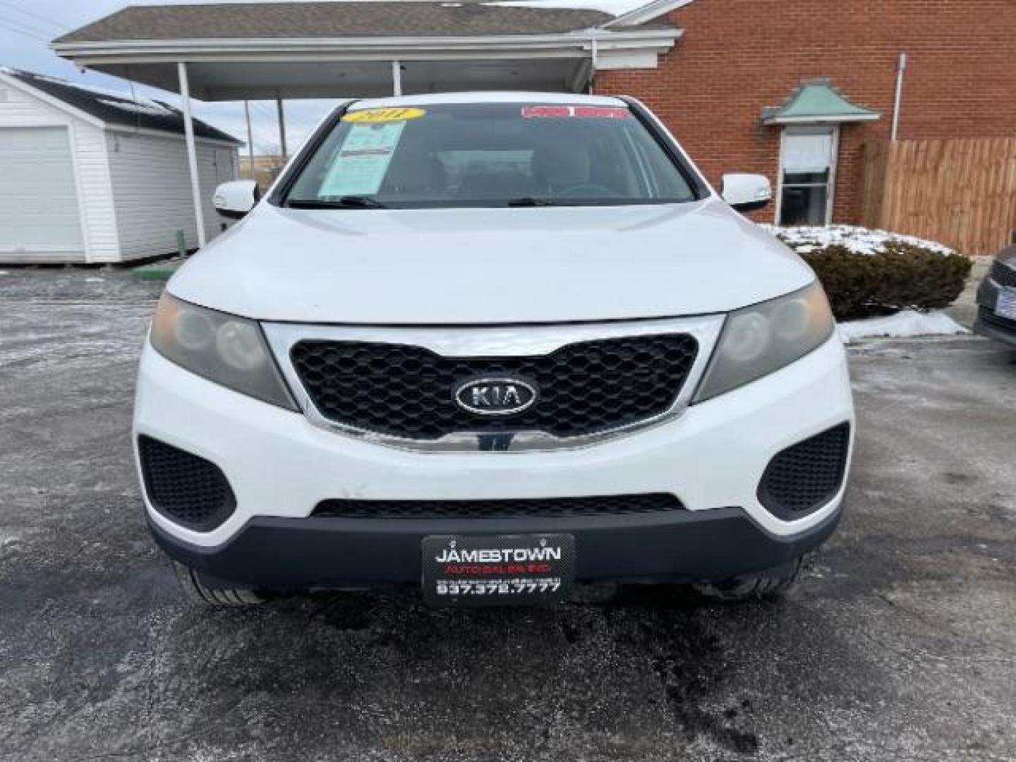 2011 Snow White Pearl Kia Sorento LX 2WD (5XYKT3A14BG) with an 2.4L L4 DOHC 16V engine, 6-Speed Automatic transmission, located at 1865 W 2nd St., Xenia, OH, 45385, (937) 372-7777, 39.681259, -83.961945 - Photo#5