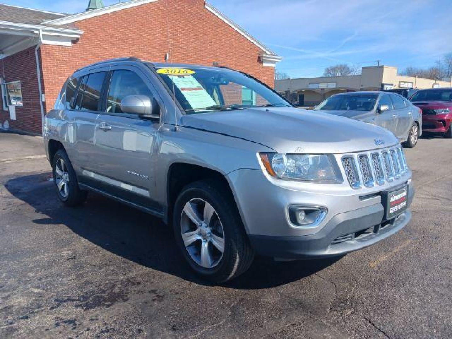 2016 Silver Jeep Compass Latitude 4WD (1C4NJDEB5GD) with an 2.4L L4 DOHC 16V engine, 6-Speed Automatic transmission, located at 1865 W 2nd St., Xenia, OH, 45385, (937) 372-7777, 39.681259, -83.961945 - Photo#0