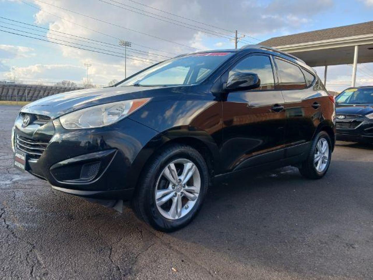 2011 Ash Black Mica Hyundai Tucson SPORT UTILITY 4-DR (KM8JUCAC2BU) with an 2.4L L4 DOHC 16V engine, 6-Speed Automatic transmission, located at 1865 W 2nd St., Xenia, OH, 45385, (937) 372-7777, 39.681259, -83.961945 - Photo#2