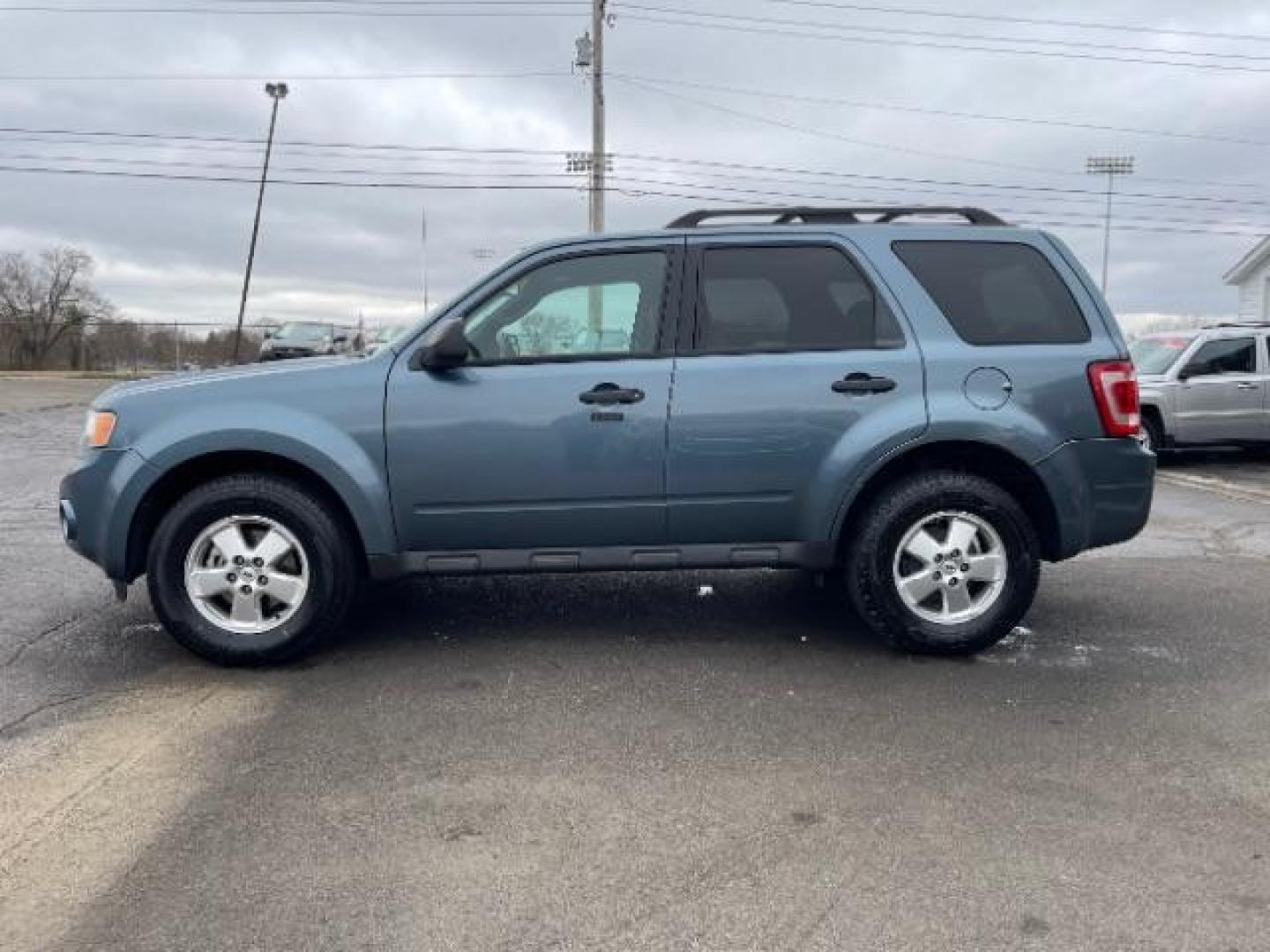 2012 Blue Flame Metallic Ford Escape XLT FWD (1FMCU0DG1CK) with an 3.0L V6 DOHC 24V engine, 6-Speed Automatic transmission, located at 1865 W 2nd St., Xenia, OH, 45385, (937) 372-7777, 39.681259, -83.961945 - Photo#2