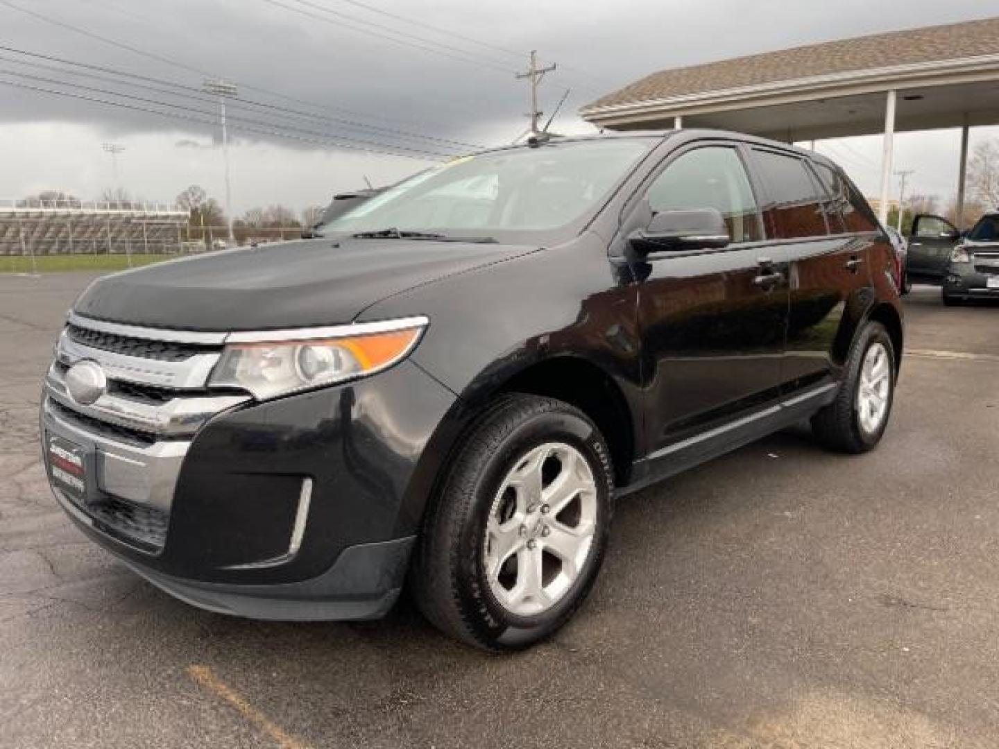 2014 Tuxedo Black Metallic Ford Edge SEL AWD (2FMDK4JC1EB) with an 3.5L V6 DOHC 24V engine, 6-Speed Automatic transmission, located at 1865 W 2nd St., Xenia, OH, 45385, (937) 372-7777, 39.681259, -83.961945 - Photo#1