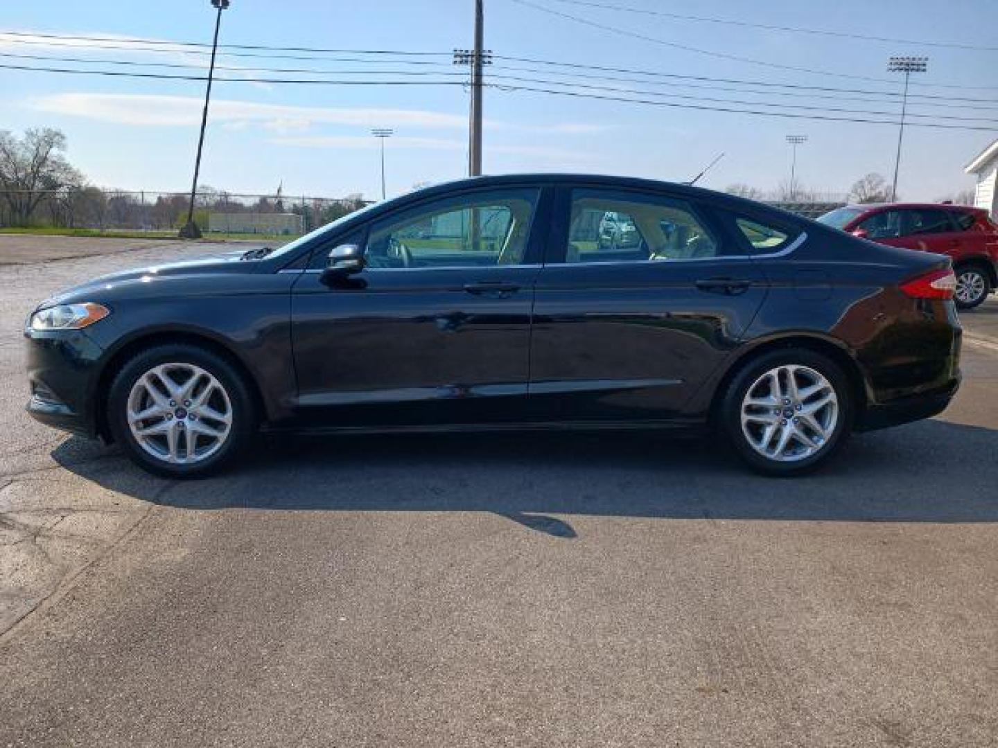 2013 Tuxedo Black Metallic Ford Fusion SE (3FA6P0H70DR) with an 2.5L L4 DOHC 16V engine, located at 1865 W 2nd St., Xenia, OH, 45385, (937) 372-7777, 39.681259, -83.961945 - Photo#3